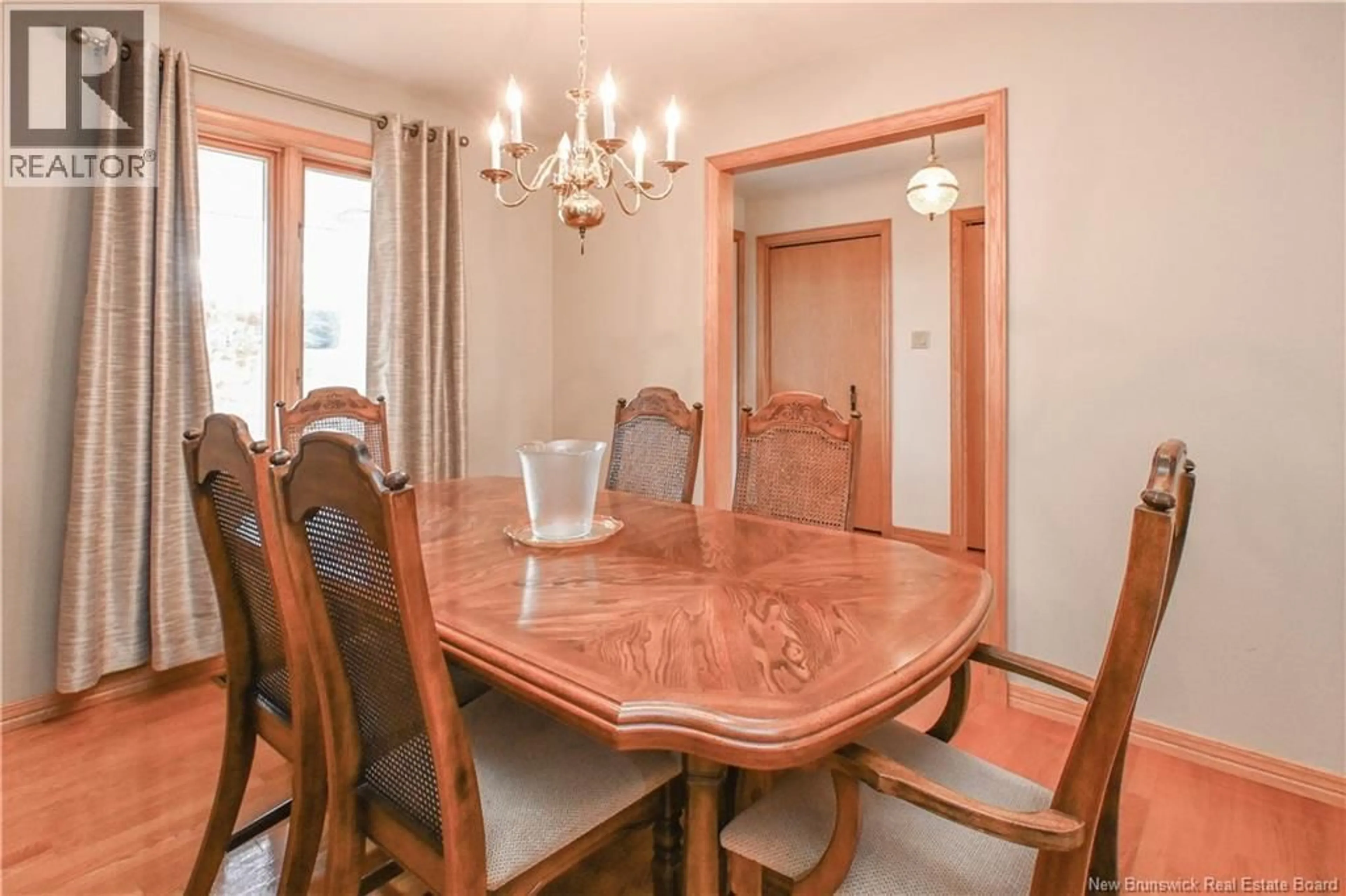 Dining room, wood/laminate floor for 858 BOUL DES ACADIENS BOULEVARD, Bertrand New Brunswick E1W1H3