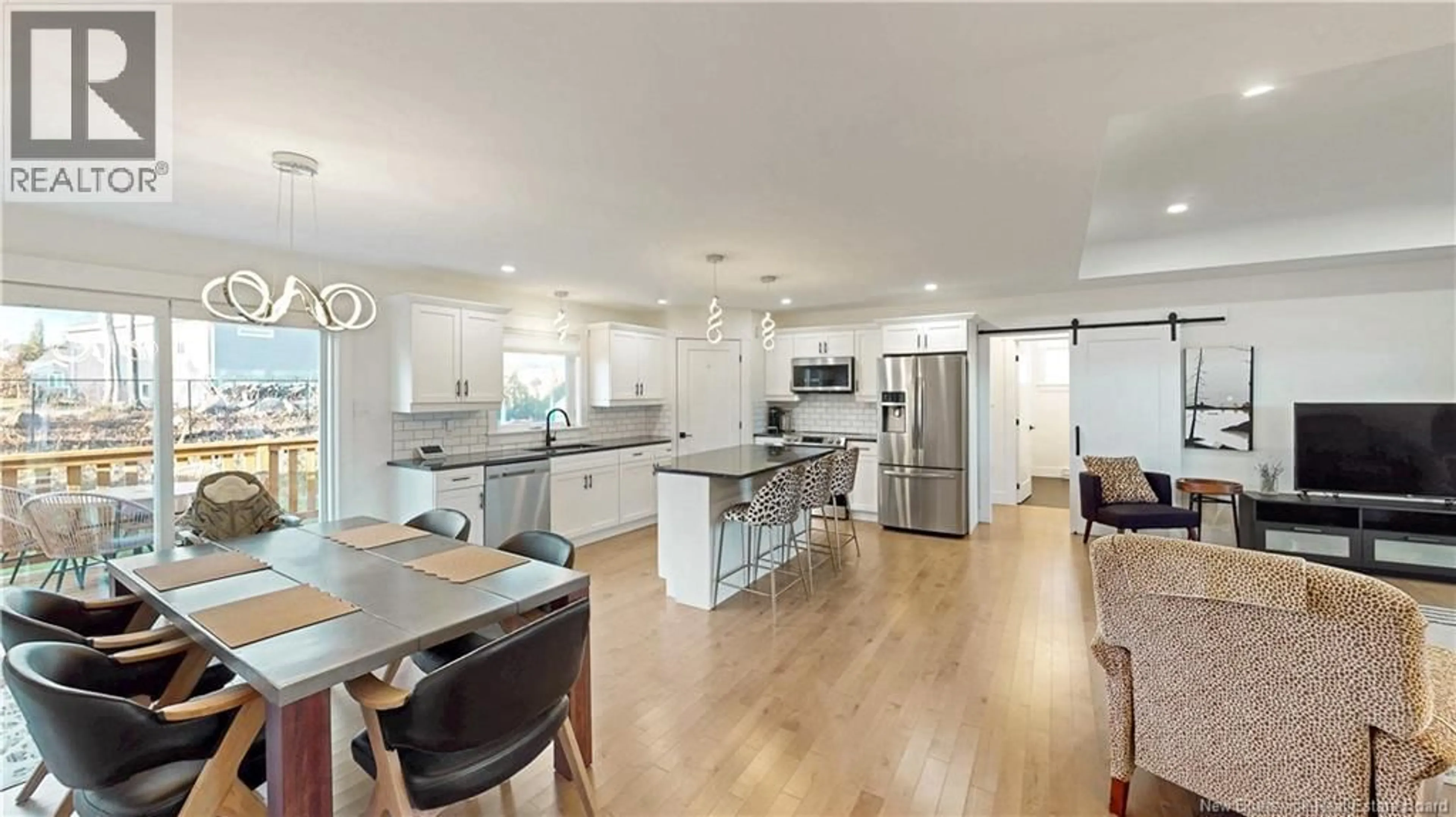 Open concept kitchen, wood/laminate floor for 23 GOSHAWK DRIVE, Quispamsis New Brunswick E2E0W8