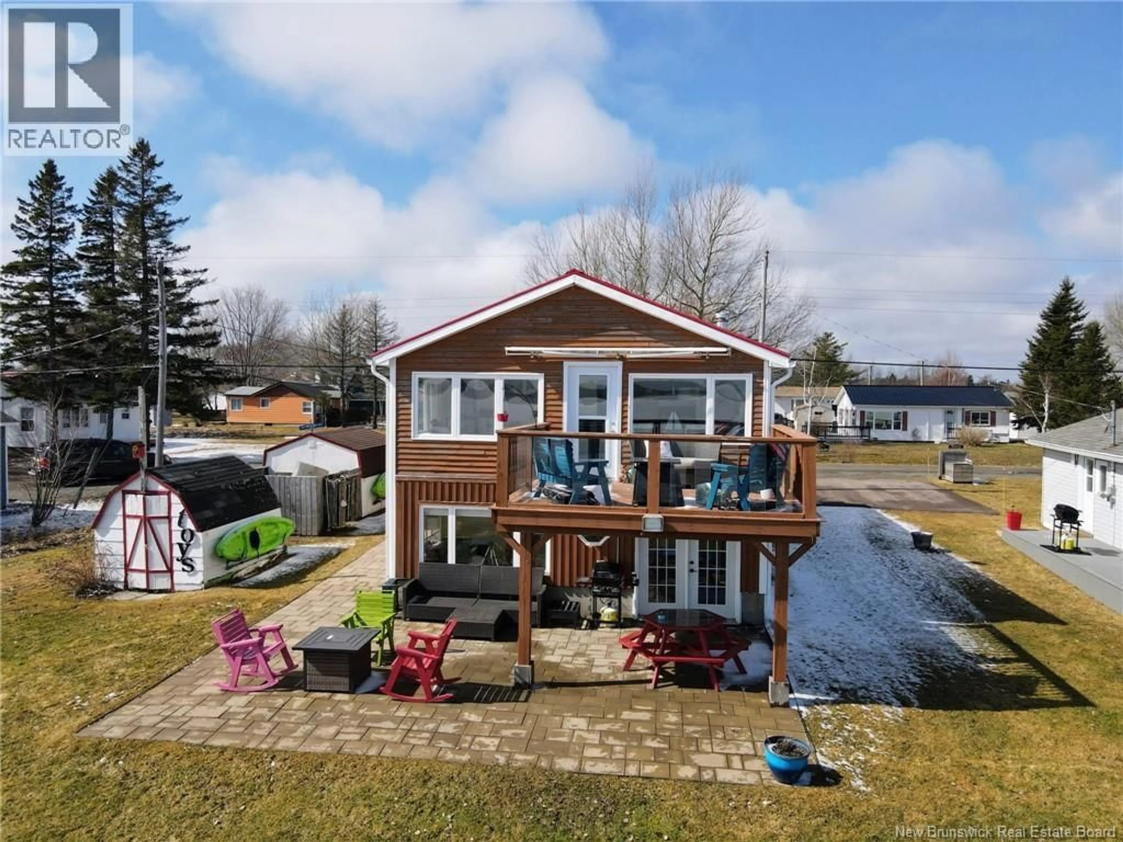 A pic from outside/outdoor area/front of a property/back of a property/a pic from drone, water/lake/river/ocean view for 2 DE LA MER BOULEVARD, Cocagne New Brunswick E4R2L9
