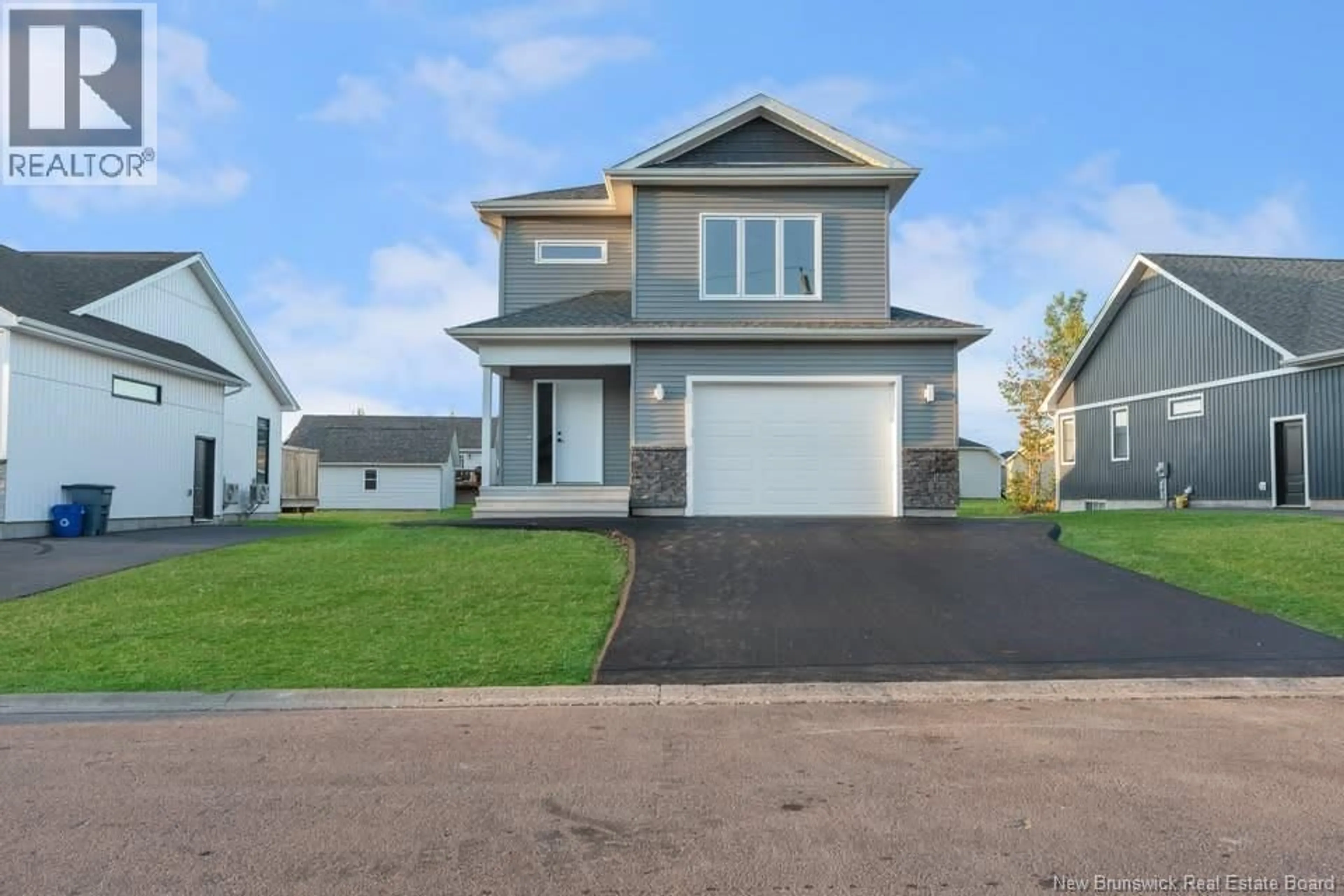 Home with vinyl exterior material, street for 64 GUY STREET, Shediac New Brunswick E4P0L5