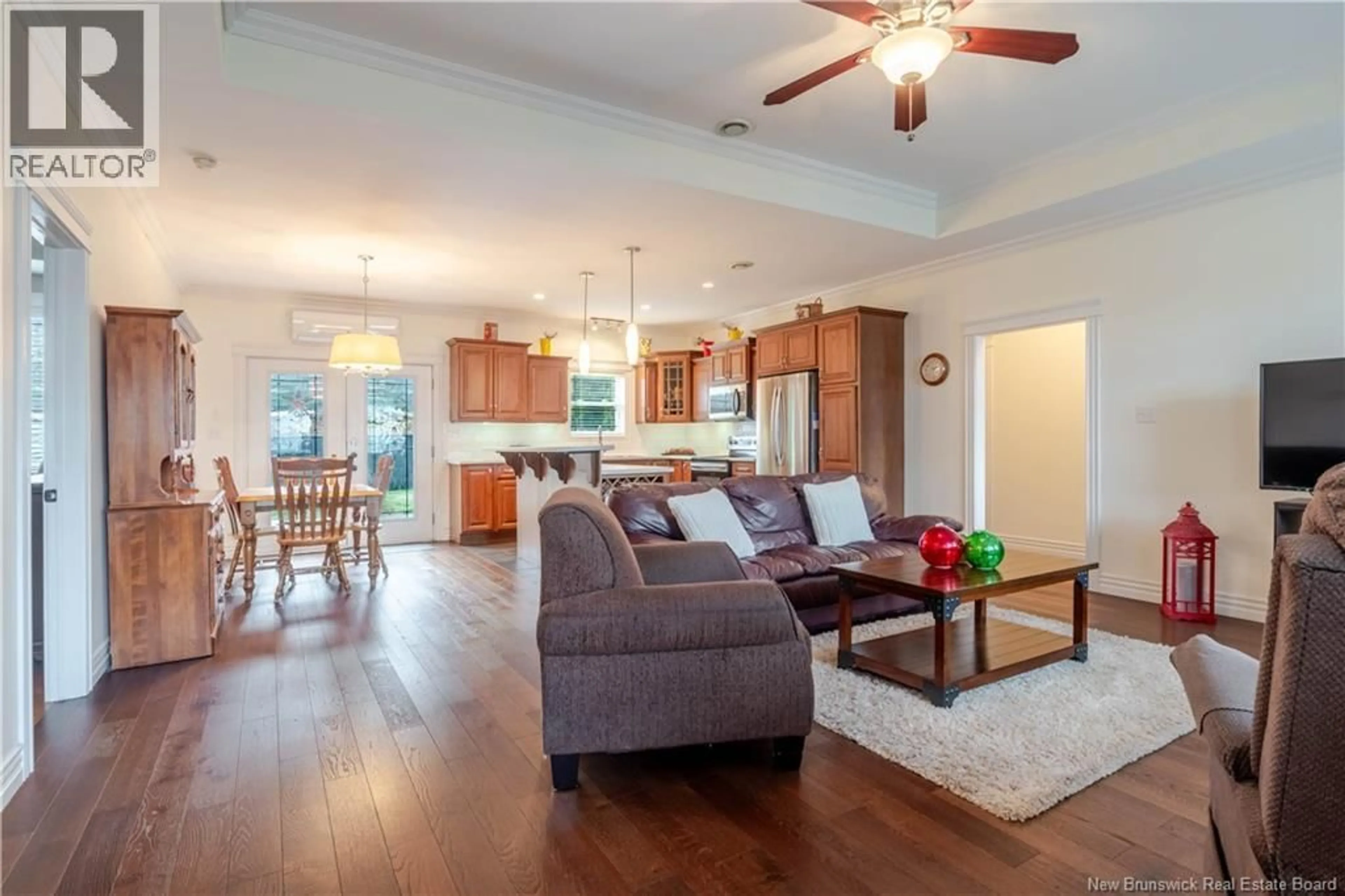 Open concept kitchen, wood/laminate floor for 18 HOWE CRESCENT, Oromocto New Brunswick E2V4M5