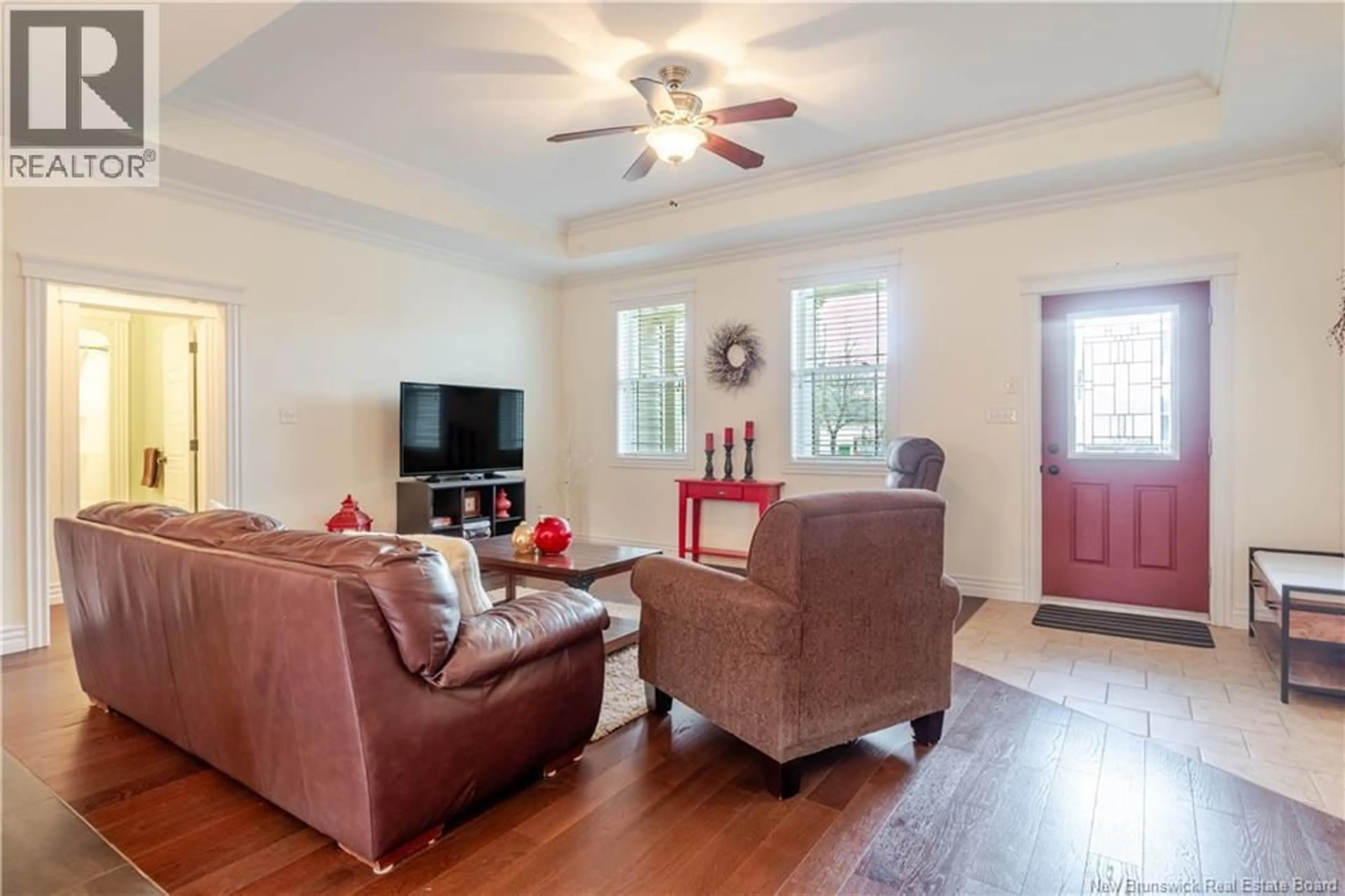 Living room with furniture, wood/laminate floor for 18 HOWE CRESCENT, Oromocto New Brunswick E2V4M5