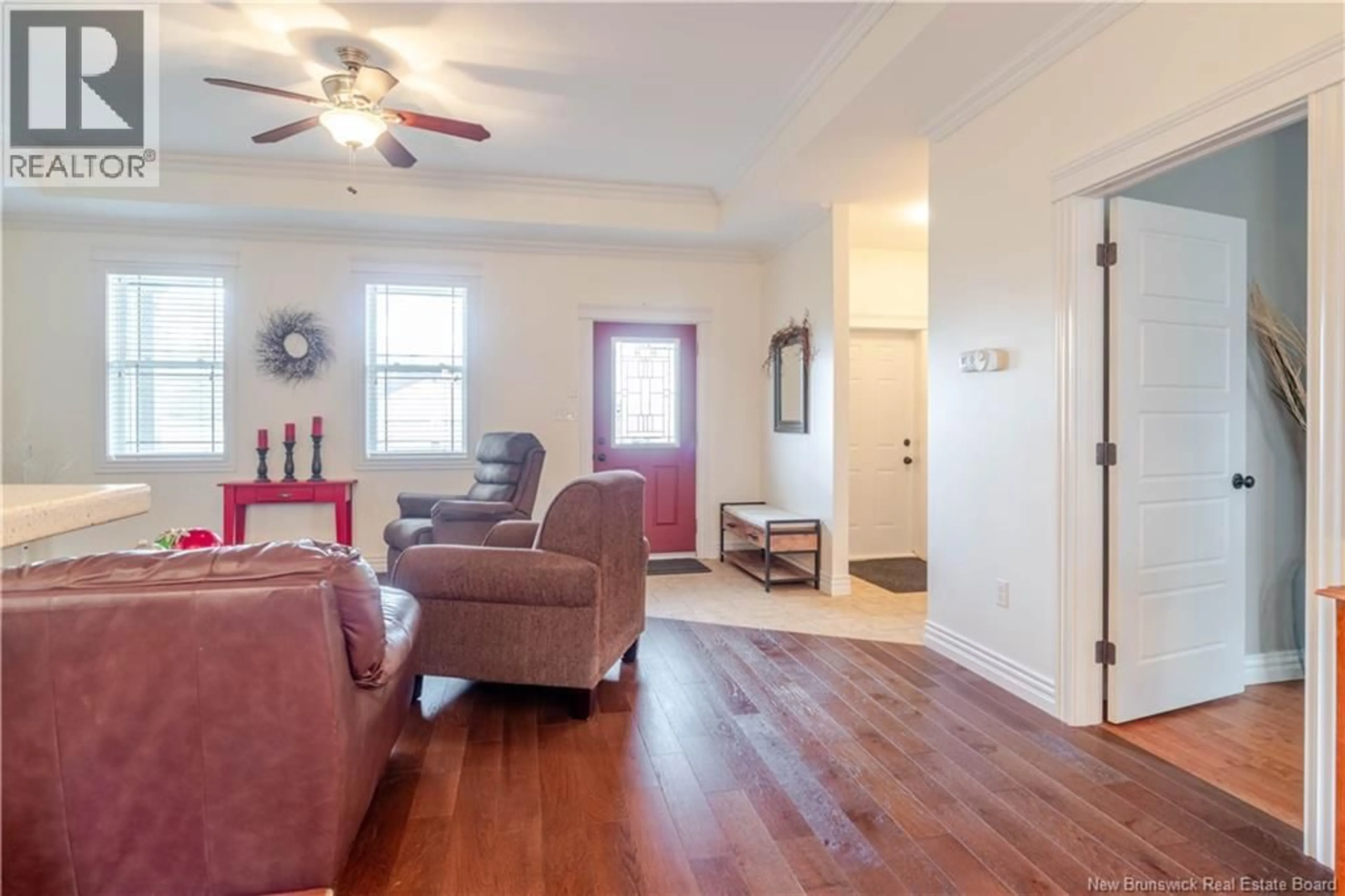 Living room with furniture, wood/laminate floor for 18 HOWE CRESCENT, Oromocto New Brunswick E2V4M5