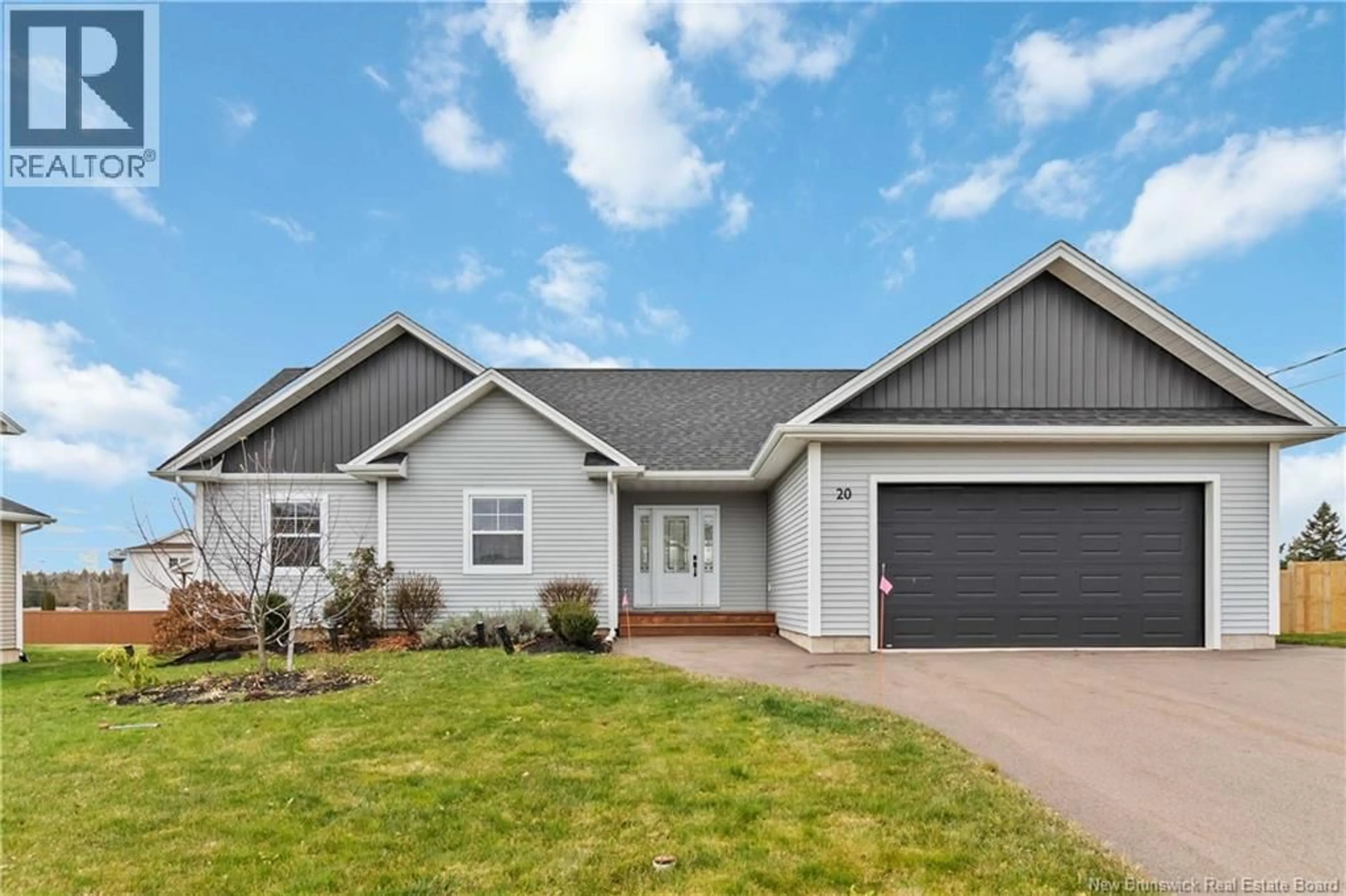 Home with vinyl exterior material, street for 20 SUZELLE, Dieppe New Brunswick E1A9R8