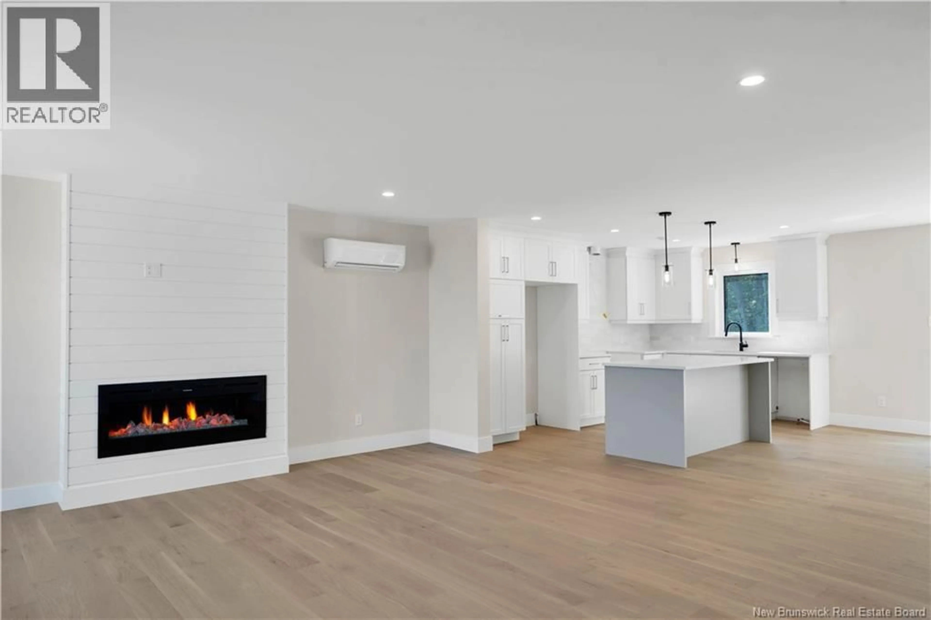 Open concept kitchen, wood/laminate floor for 66 ROBERT STREET, Shediac New Brunswick E4P0H6