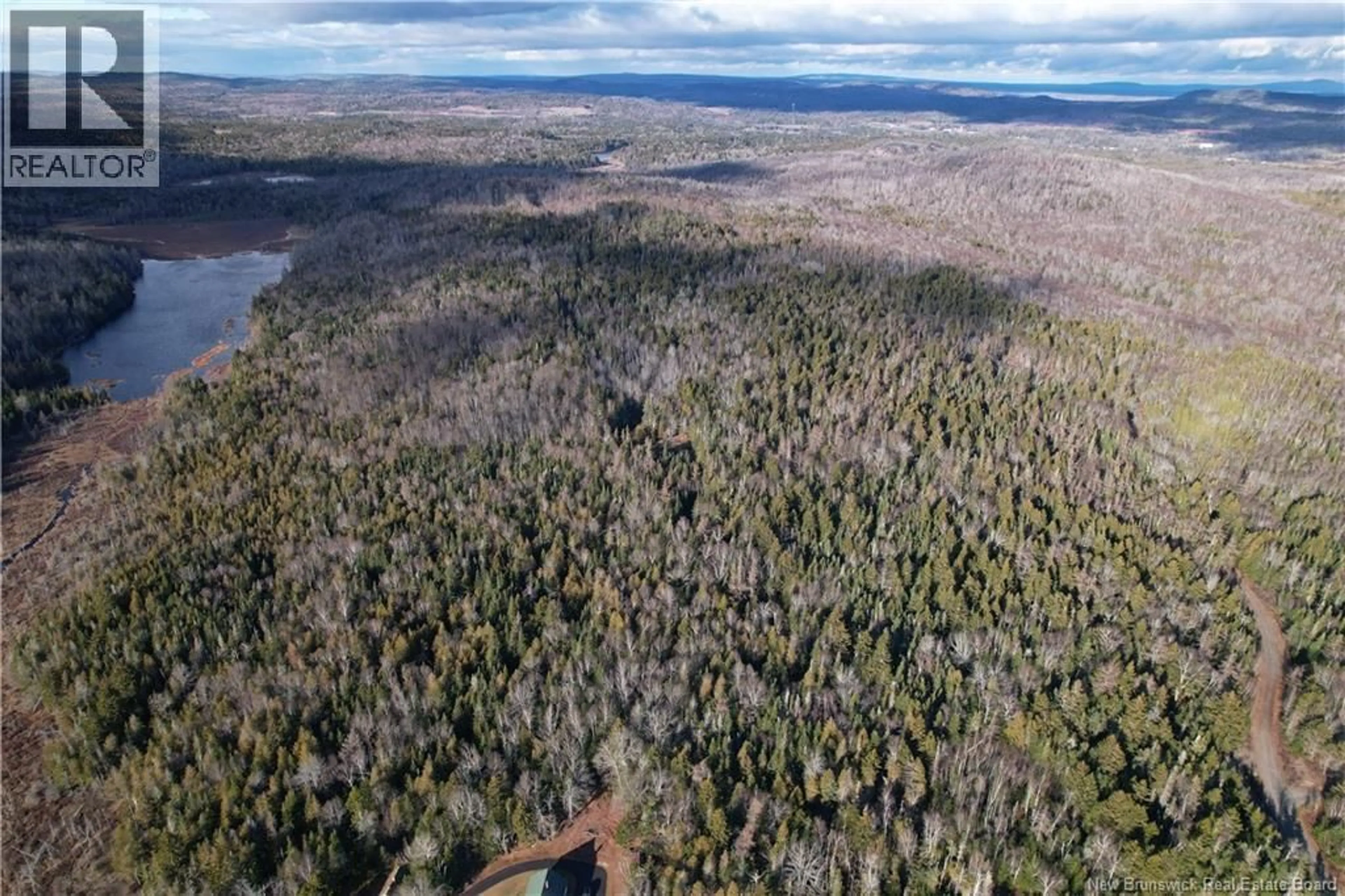 A pic from outside/outdoor area/front of a property/back of a property/a pic from drone, forest/trees view for 5463 ROUTE 127, Bocabec New Brunswick E5B3H6