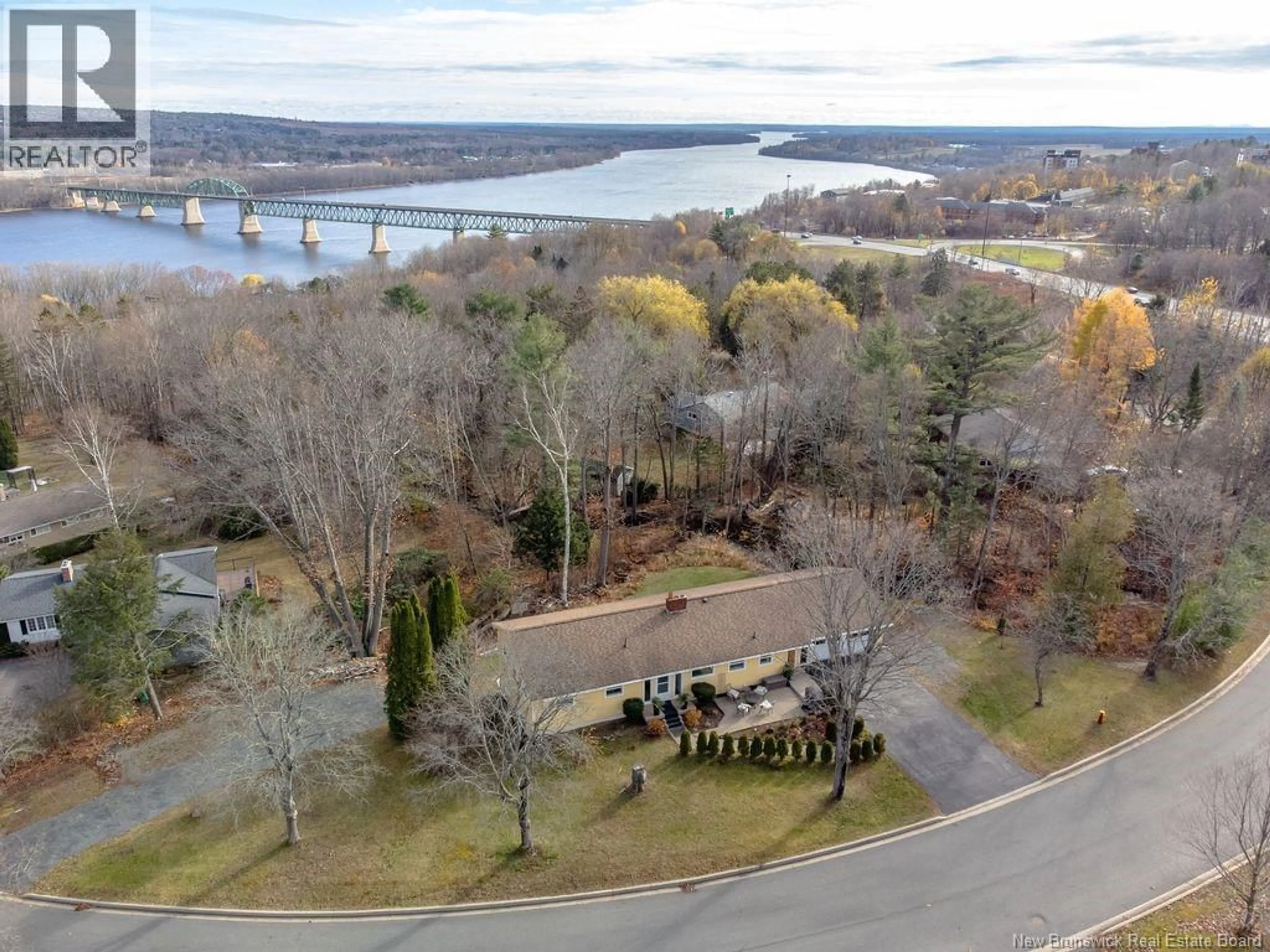 A pic from outside/outdoor area/front of a property/back of a property/a pic from drone, water/lake/river/ocean view for 31 FOREST ACRES COURT, Fredericton New Brunswick E3B4L2