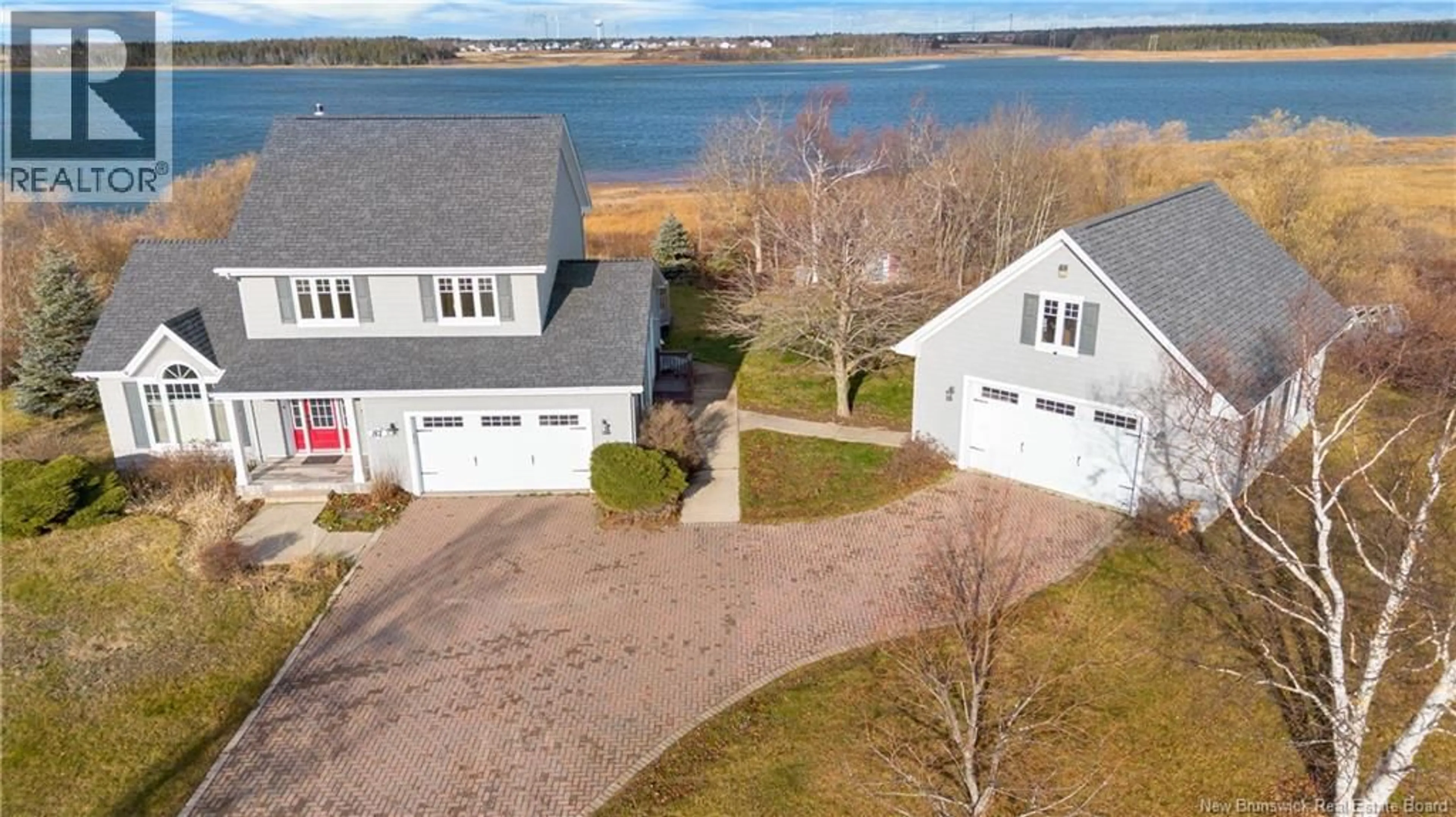 A pic from outside/outdoor area/front of a property/back of a property/a pic from drone, water/lake/river/ocean view for 81 ROUTE 305, Haut-Lamèque New Brunswick E8T3M1