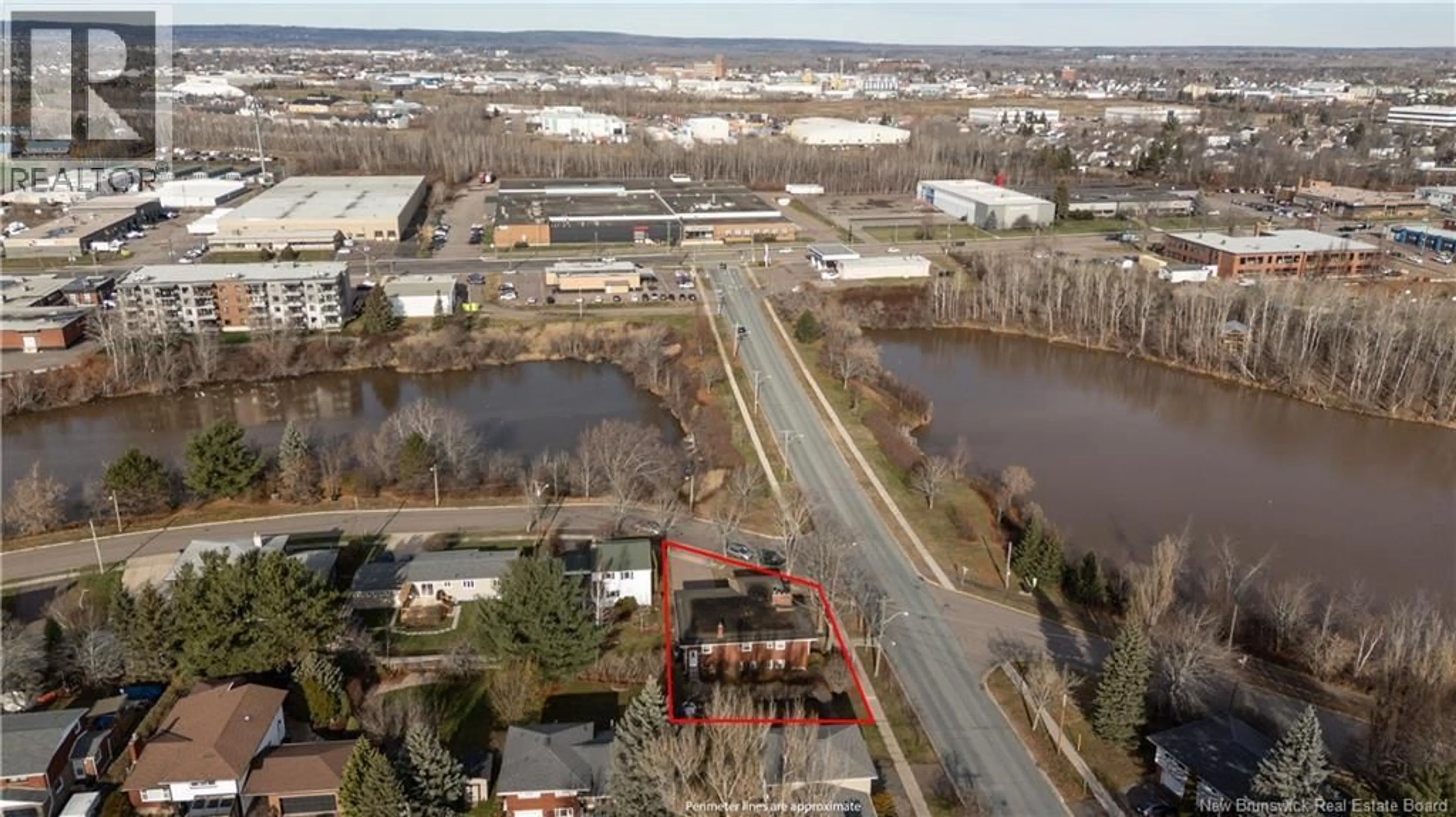A pic from outside/outdoor area/front of a property/back of a property/a pic from drone, water/lake/river/ocean view for 200 MOUNT ROYAL BOULEVARD, Moncton New Brunswick E1E2W1