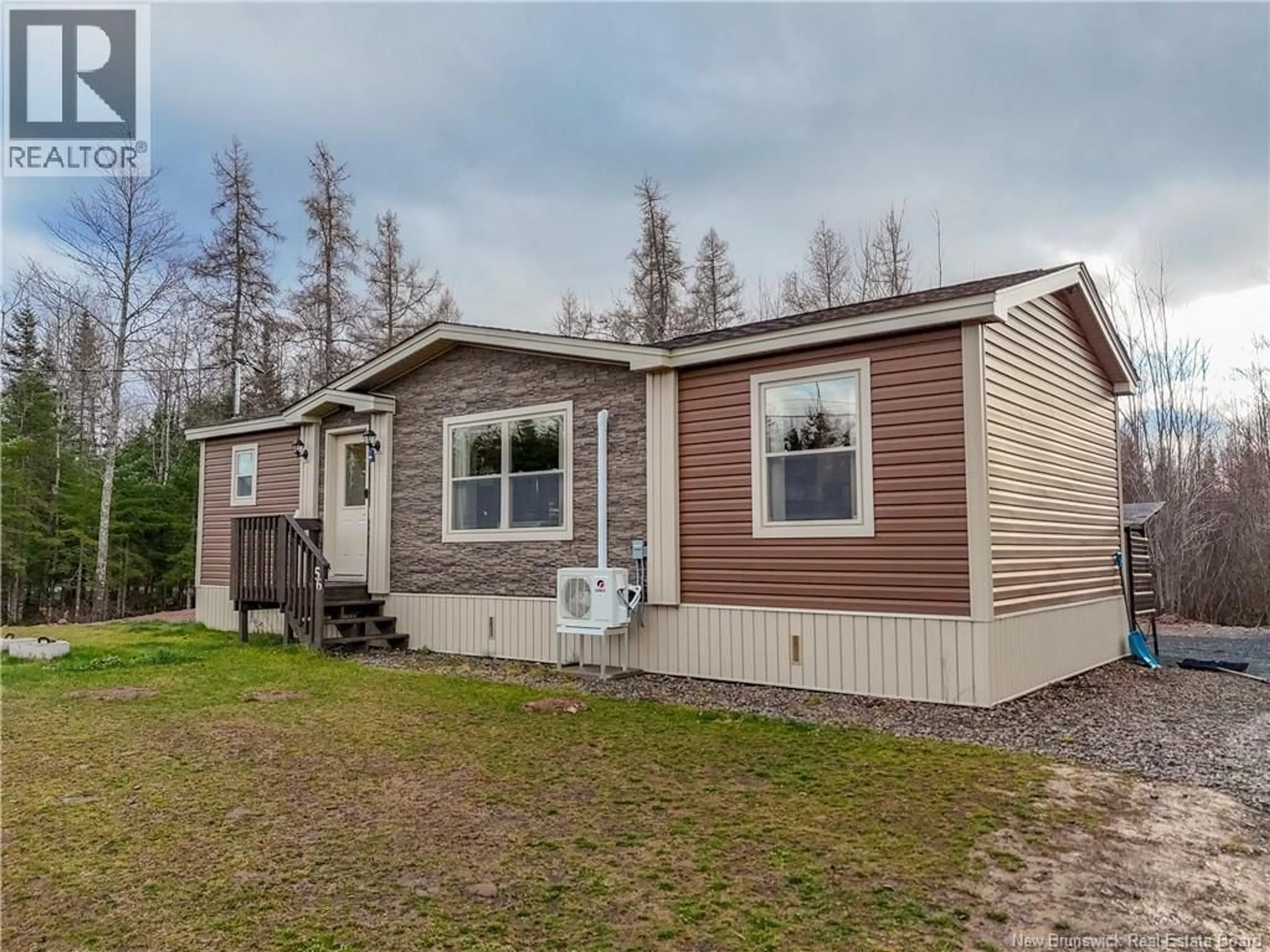 Home with vinyl exterior material, street for 56 CLARA STREET, Rusagonis New Brunswick E3B0T8