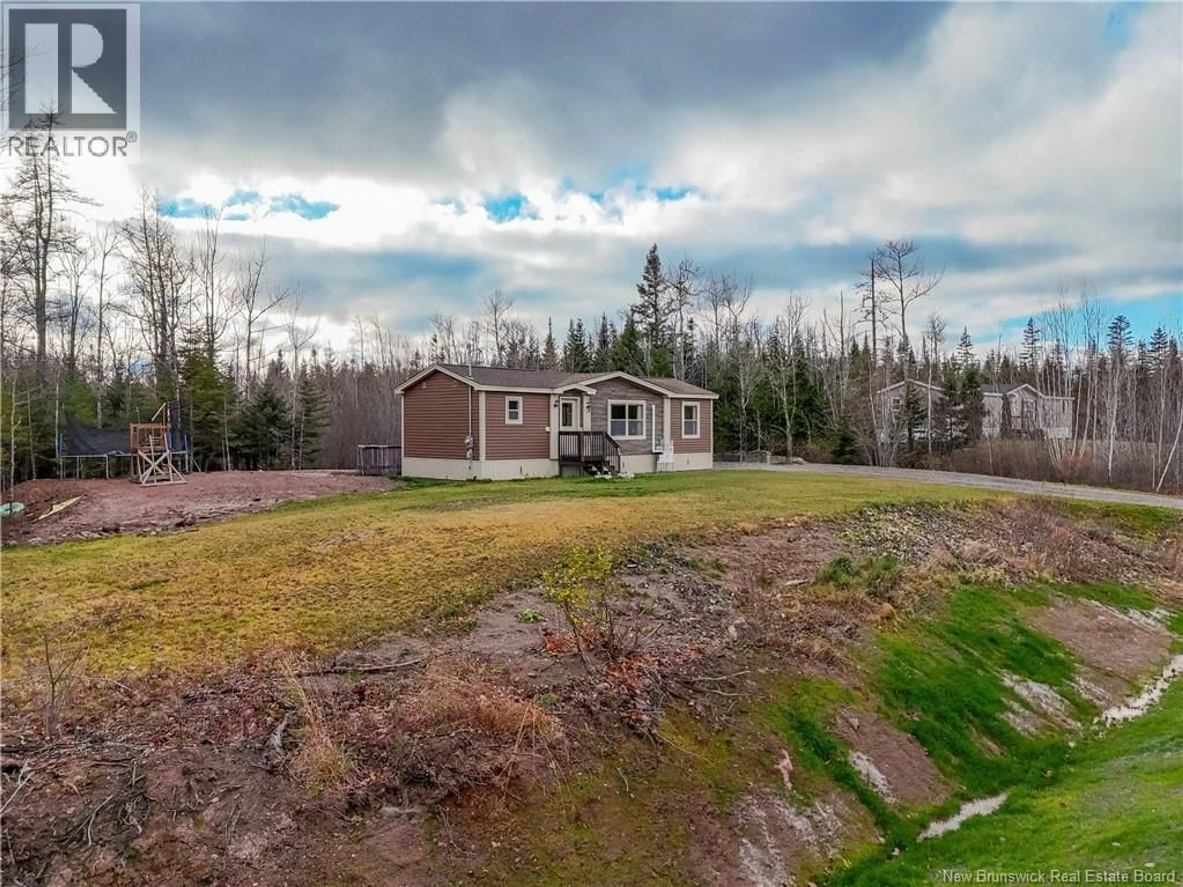 A pic from outside/outdoor area/front of a property/back of a property/a pic from drone, unknown for 56 CLARA STREET, Rusagonis New Brunswick E3B0T8