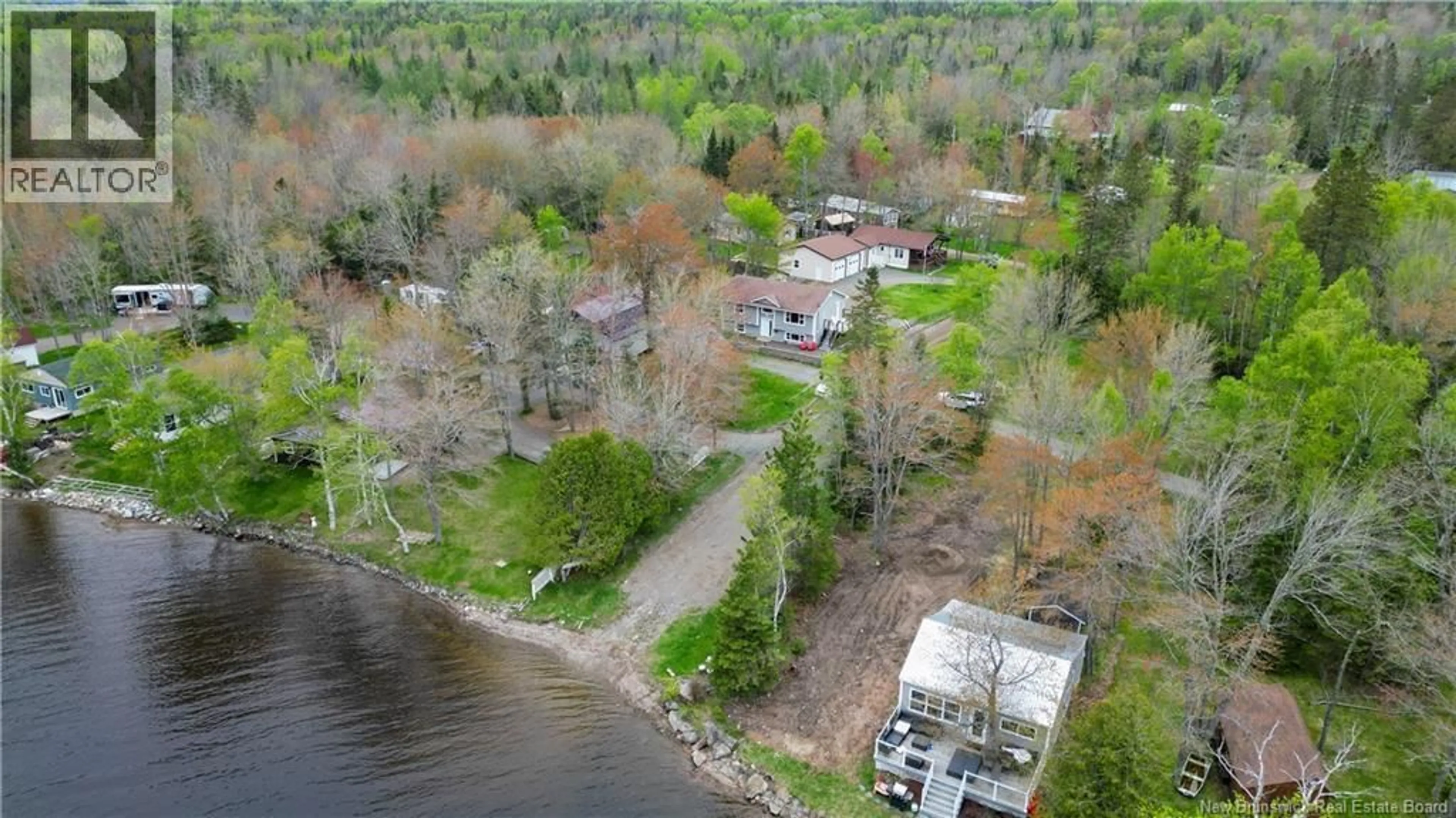 A pic from outside/outdoor area/front of a property/back of a property/a pic from drone, water/lake/river/ocean view for 70 EWART HYDE ROAD, Lake George New Brunswick E6K3L8