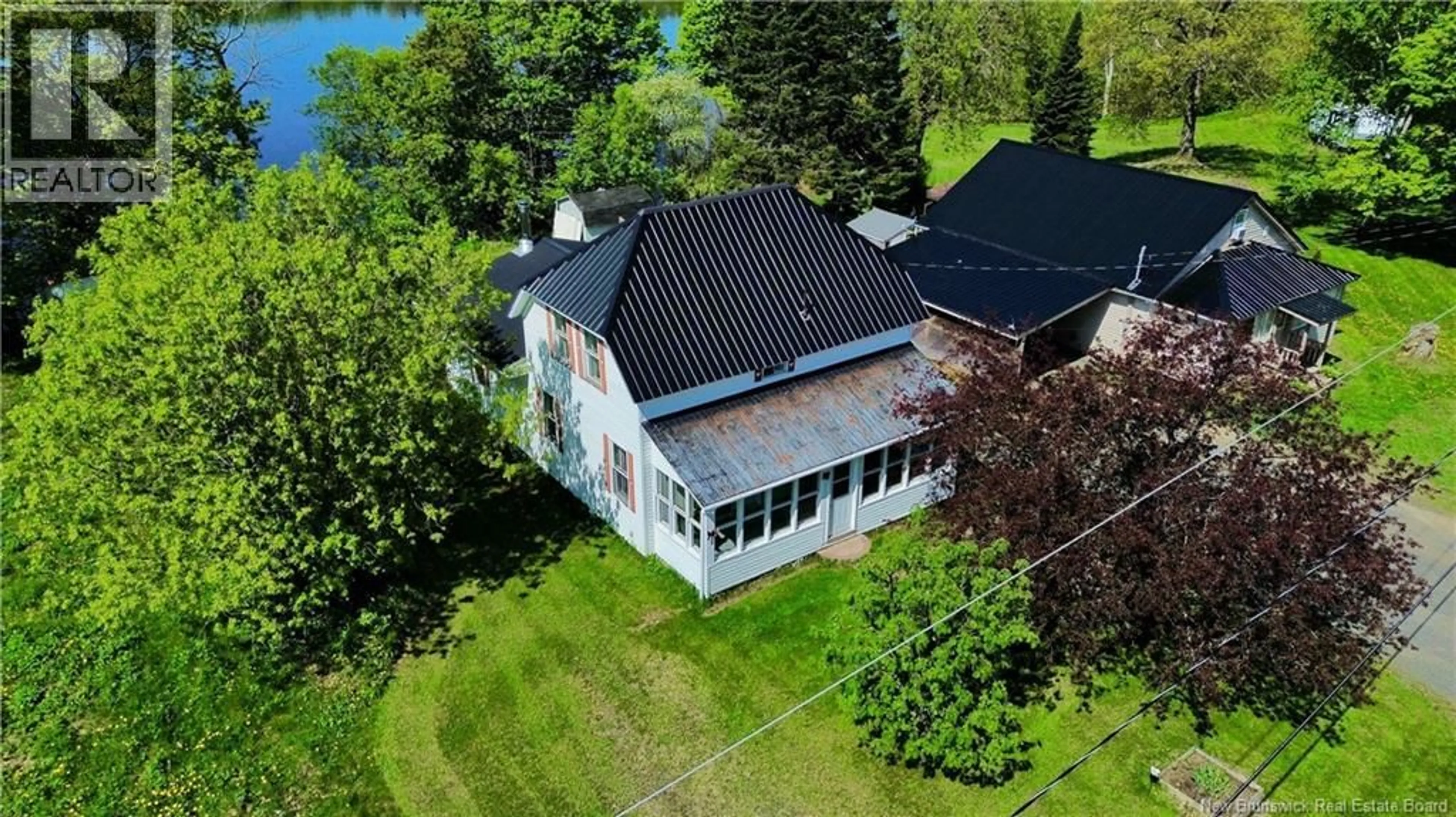 A pic from outside/outdoor area/front of a property/back of a property/a pic from drone, water/lake/river/ocean view for 205 UPPER KENT ROAD, Upper Kent New Brunswick E7J2E3
