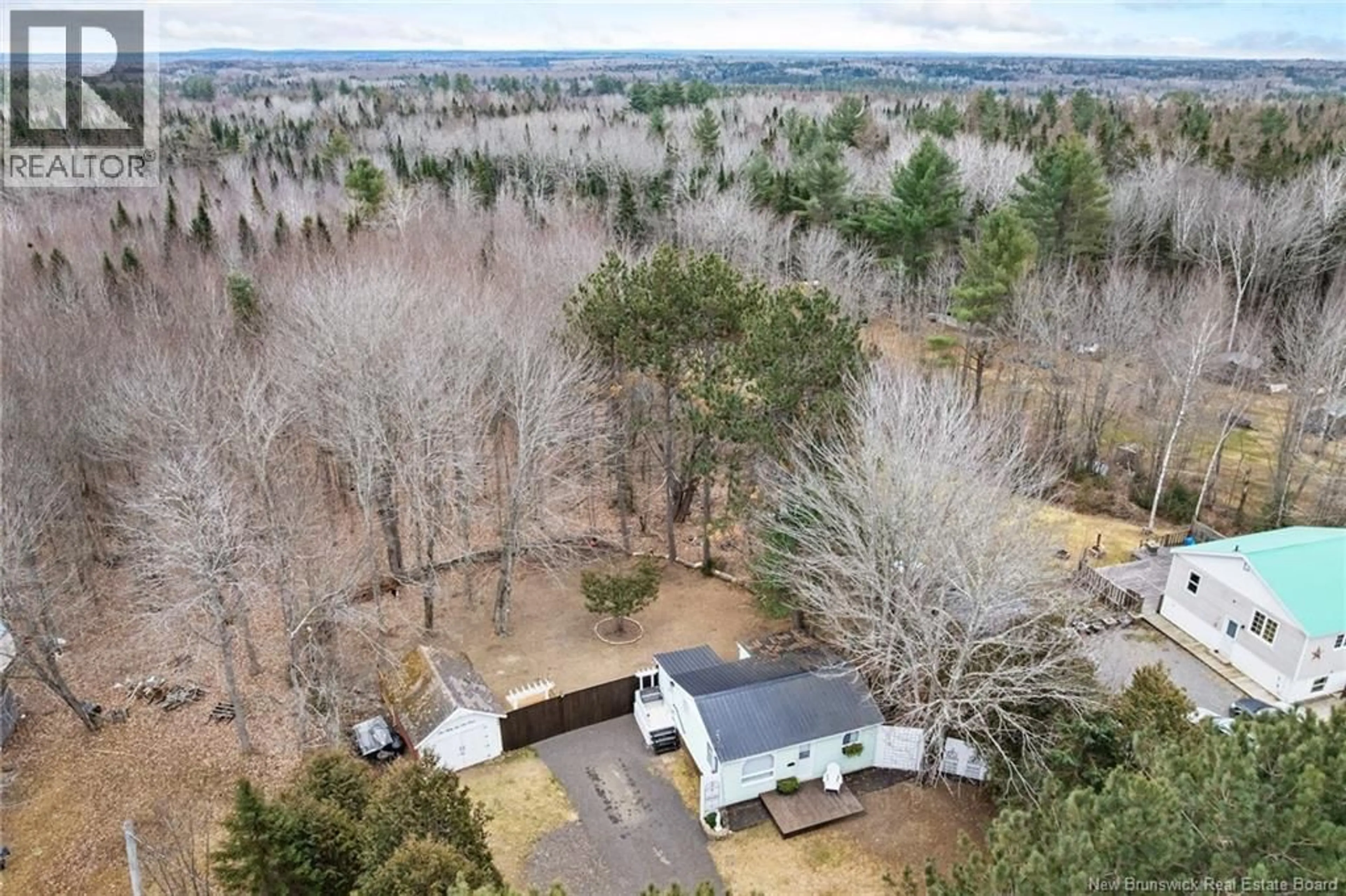 A pic from outside/outdoor area/front of a property/back of a property/a pic from drone, forest/trees view for 132 POST ROAD, Minto New Brunswick E4B3A1