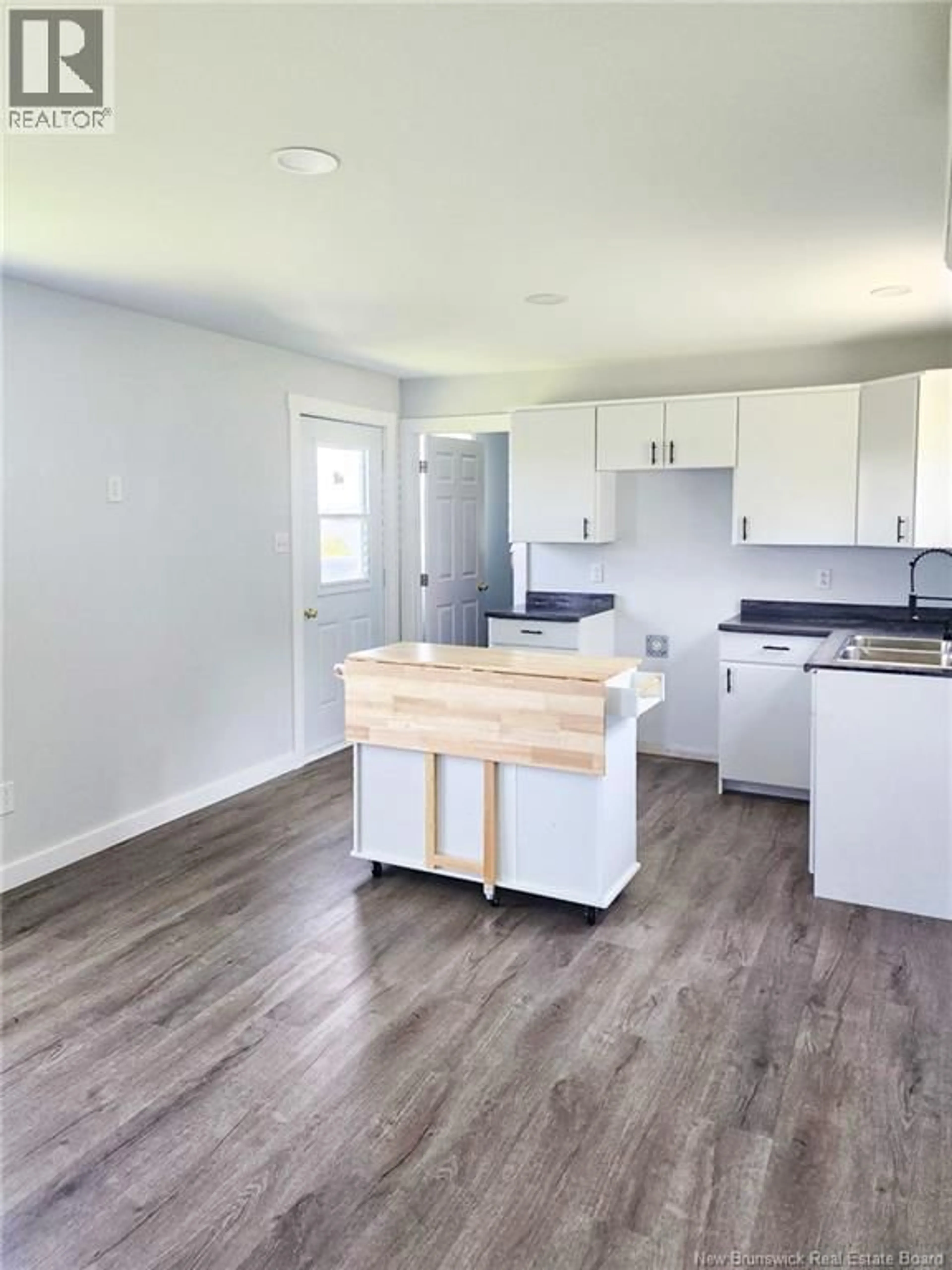 Open concept kitchen, wood/laminate floor for 6867 ROUTE 130, Bairdsville New Brunswick E7L1W9