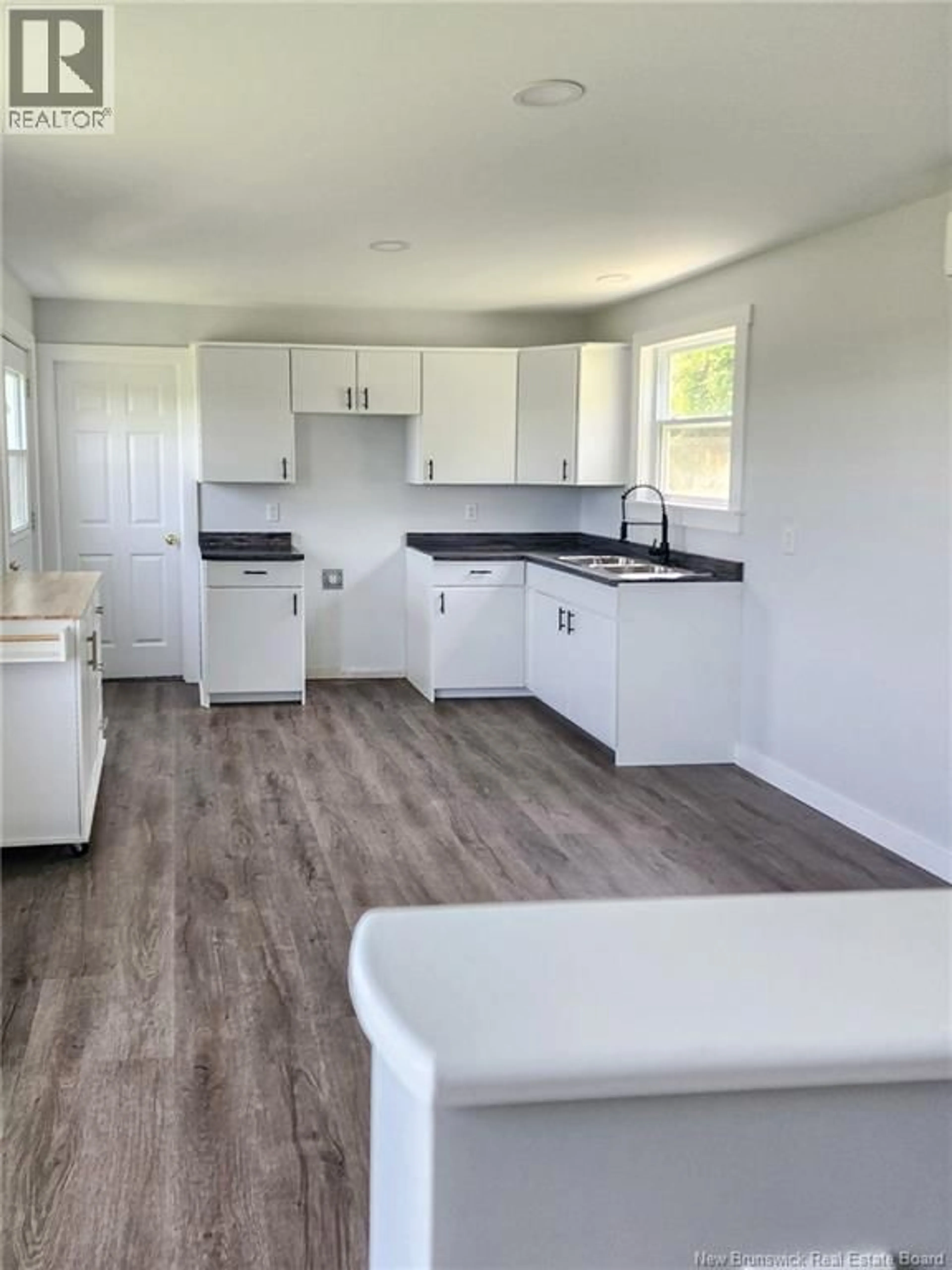 Open concept kitchen, wood/laminate floor for 6867 ROUTE 130, Bairdsville New Brunswick E7L1W9