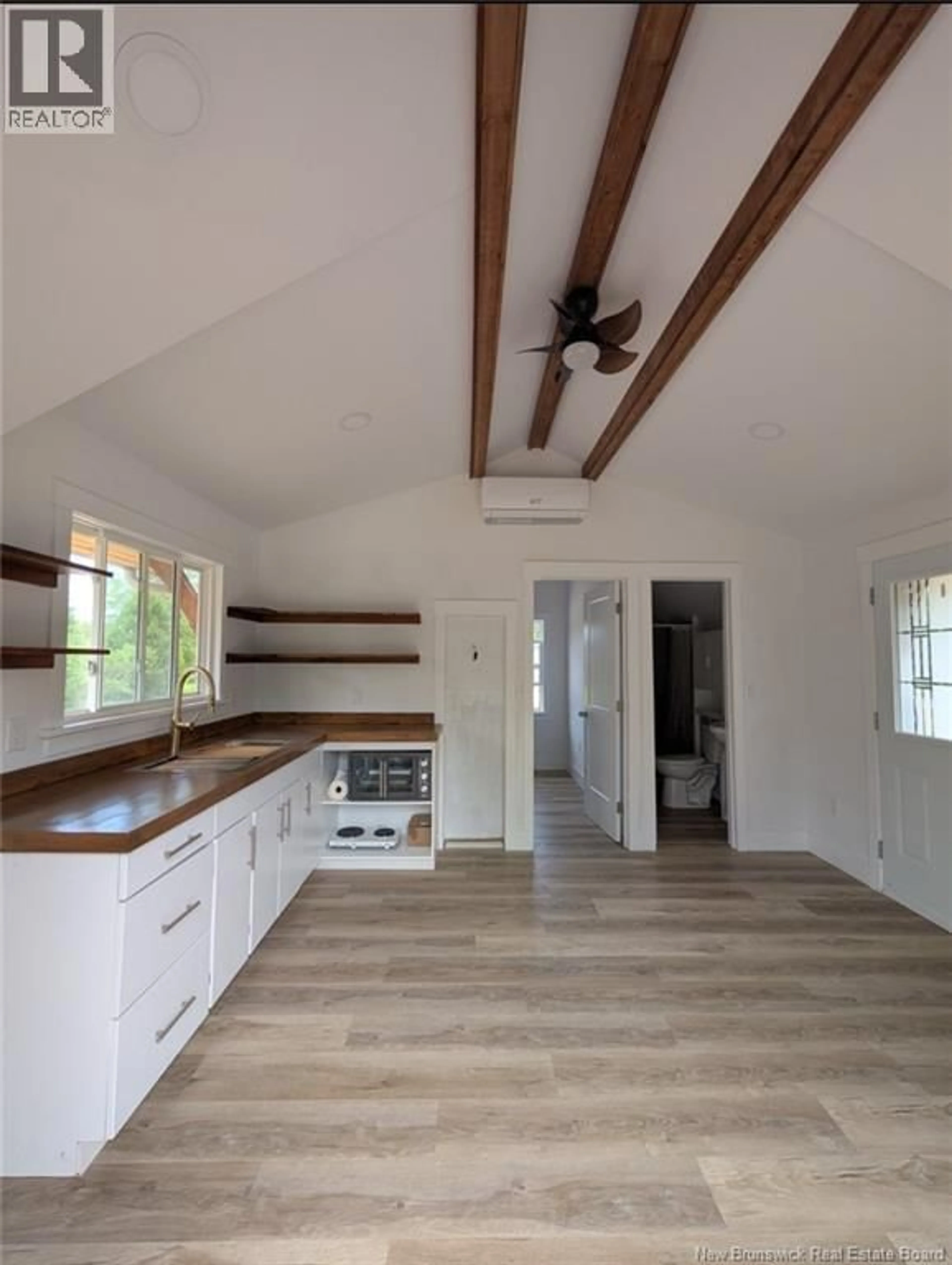 Open concept kitchen, wood/laminate floor for 629 CHEMIN PETITE RIVIERE CHEMIN, Aldouane New Brunswick E4W5C1