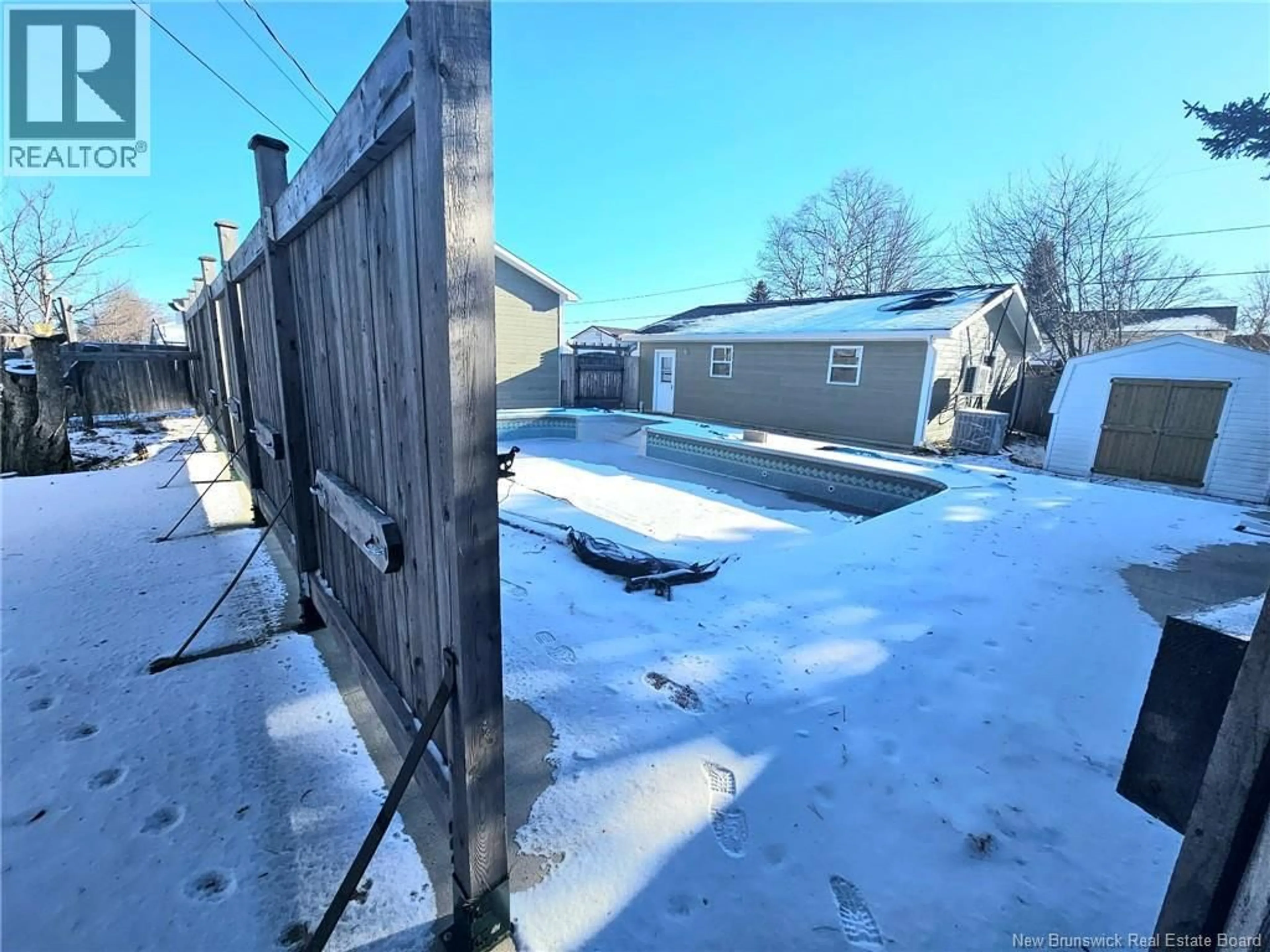 A pic from outside/outdoor area/front of a property/back of a property/a pic from drone, street for 239 GODIN, Beresford New Brunswick E8K1T4
