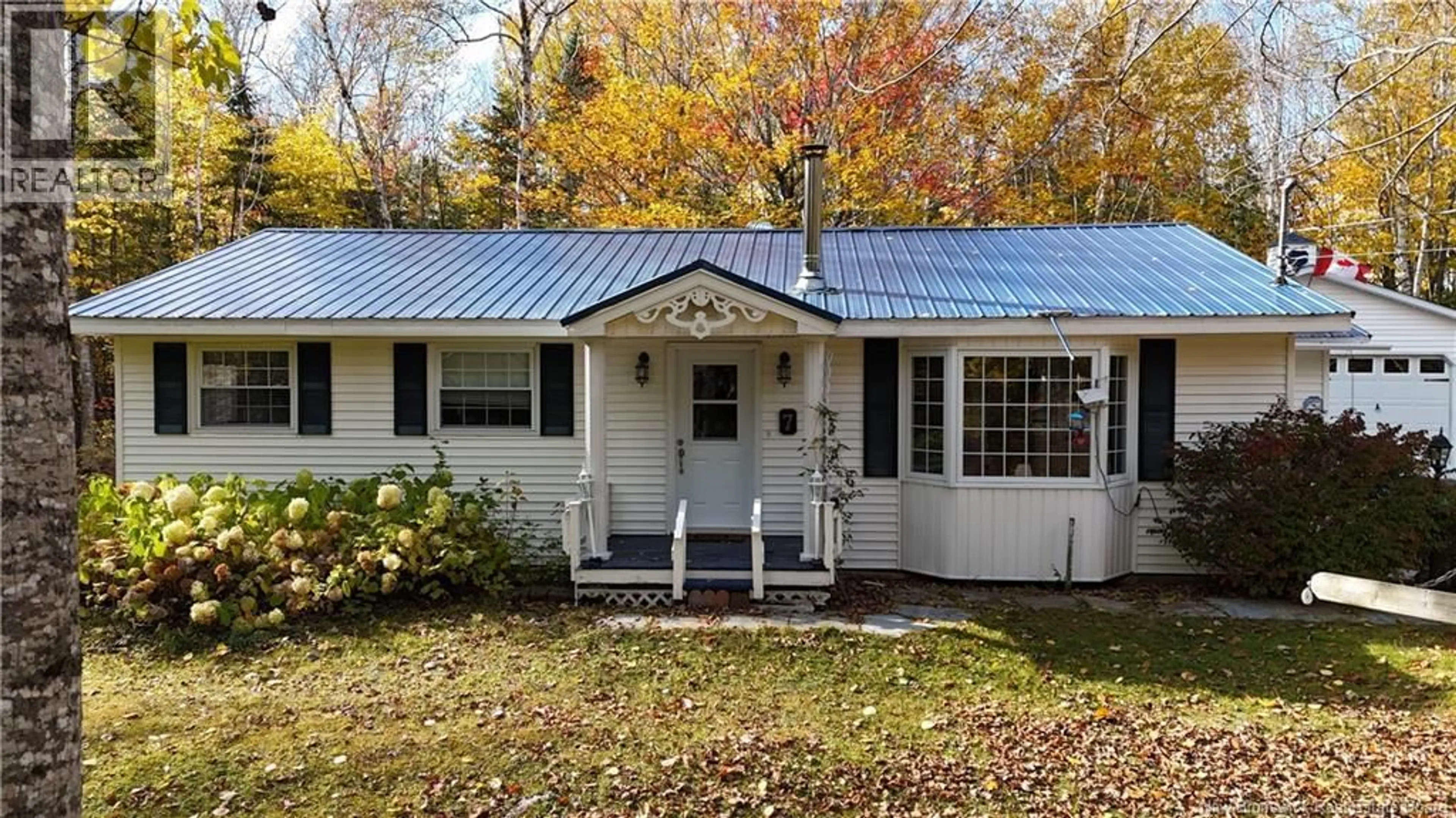 Home with vinyl exterior material, street for 7 BURNETT DRIVE, Hanwell New Brunswick E3C2H8
