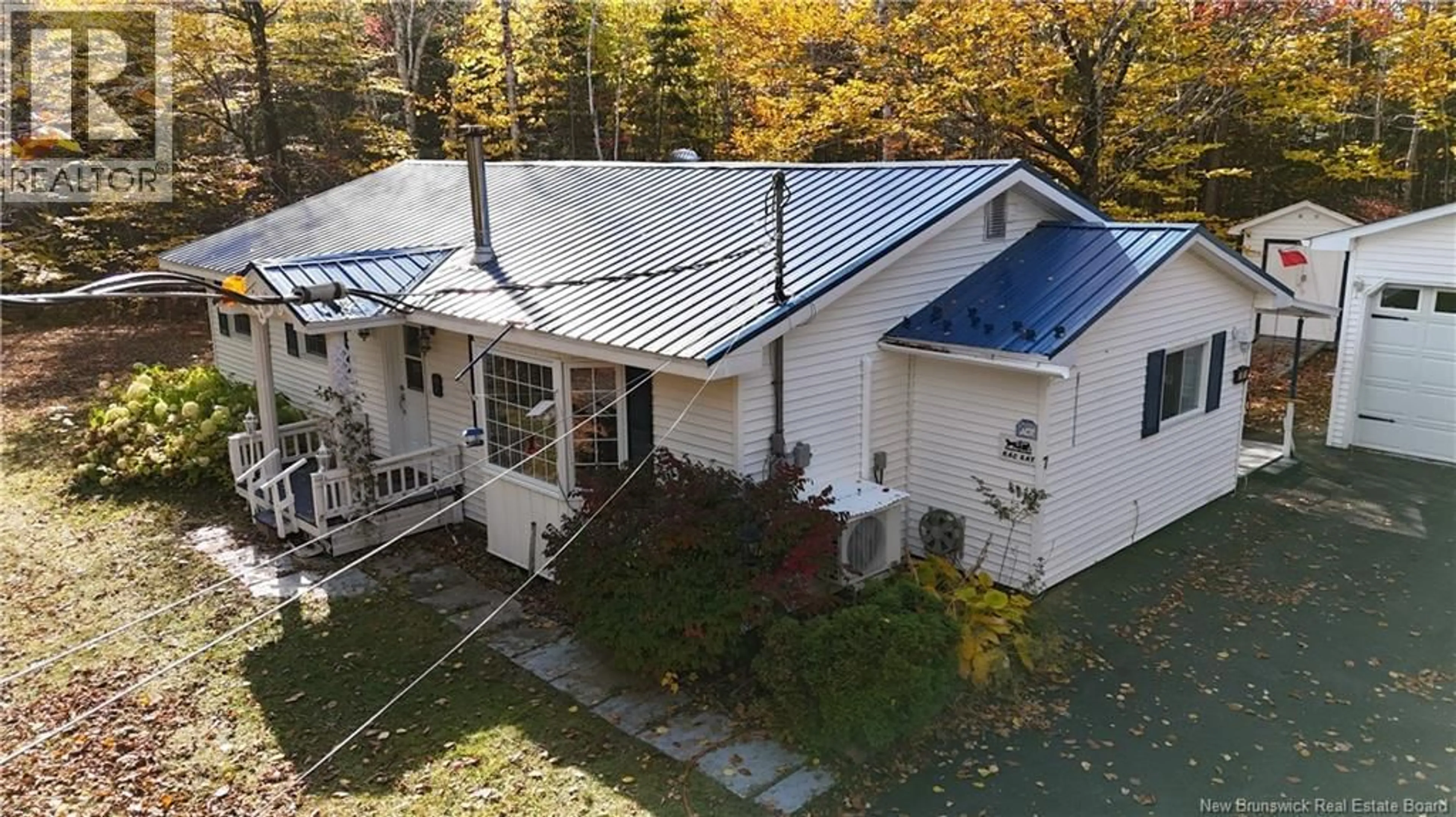 A pic from outside/outdoor area/front of a property/back of a property/a pic from drone, building for 7 BURNETT DRIVE, Hanwell New Brunswick E3C2H8