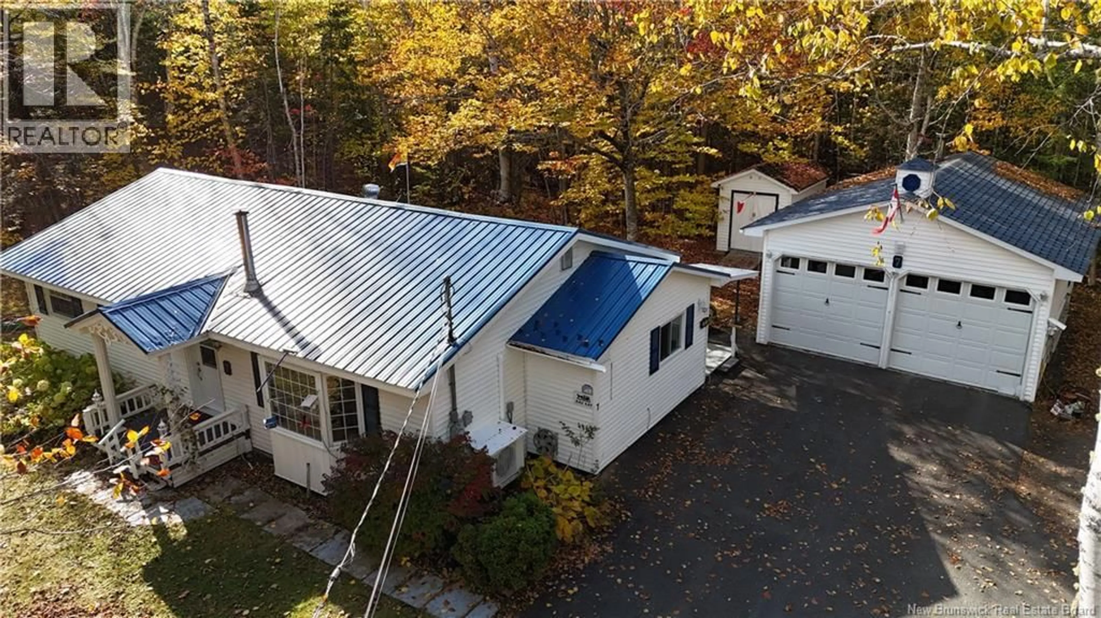 A pic from outside/outdoor area/front of a property/back of a property/a pic from drone, building for 7 BURNETT DRIVE, Hanwell New Brunswick E3C2H8