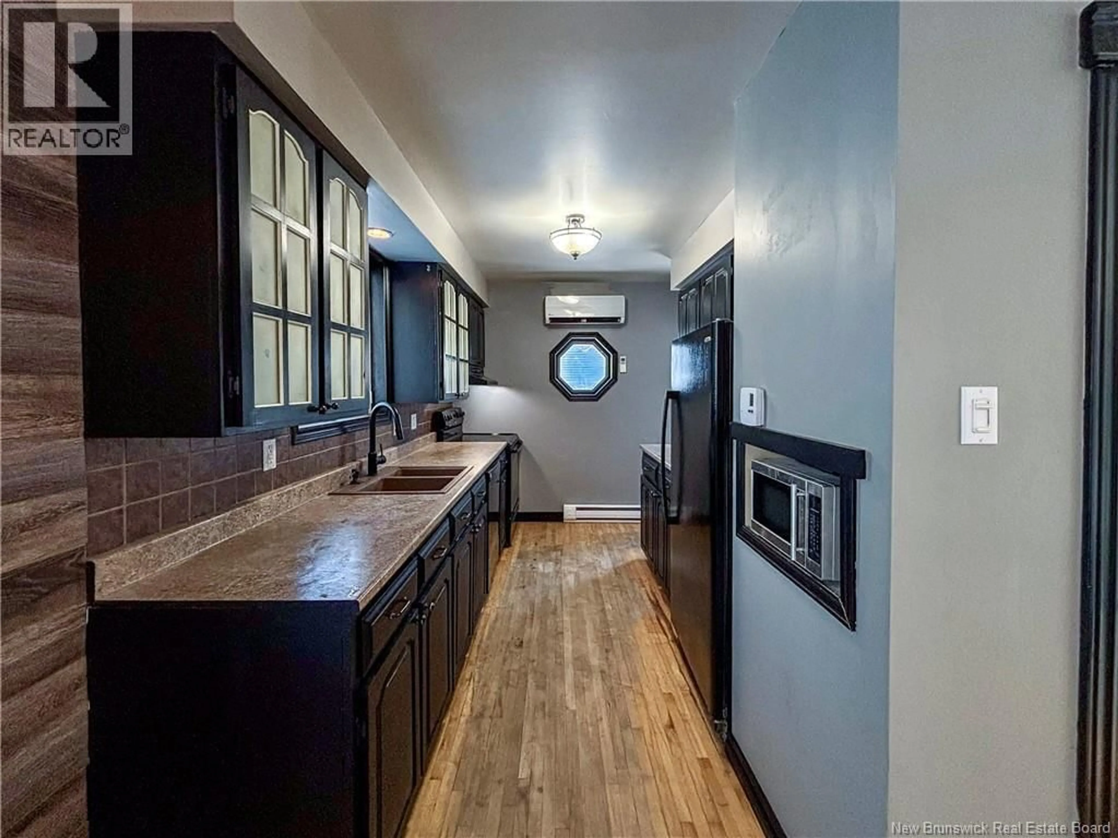 Kitchen with laundary machines, unknown for 5 BARTLETT AVENUE, Hampton New Brunswick E5N5G9