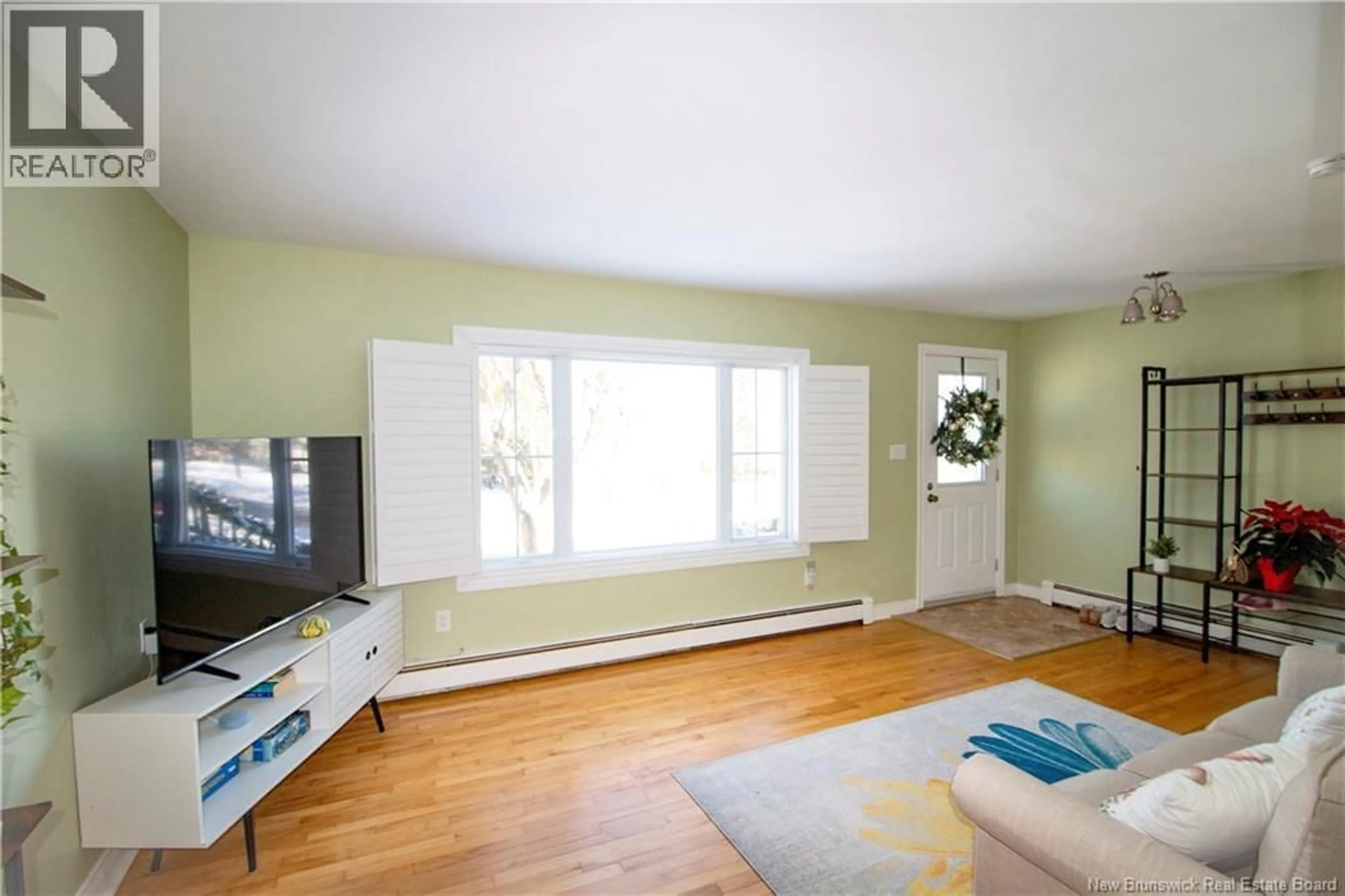 Living room with furniture, wood/laminate floor for 17 BEVERLY DRIVE, Saint John New Brunswick E2J3B1