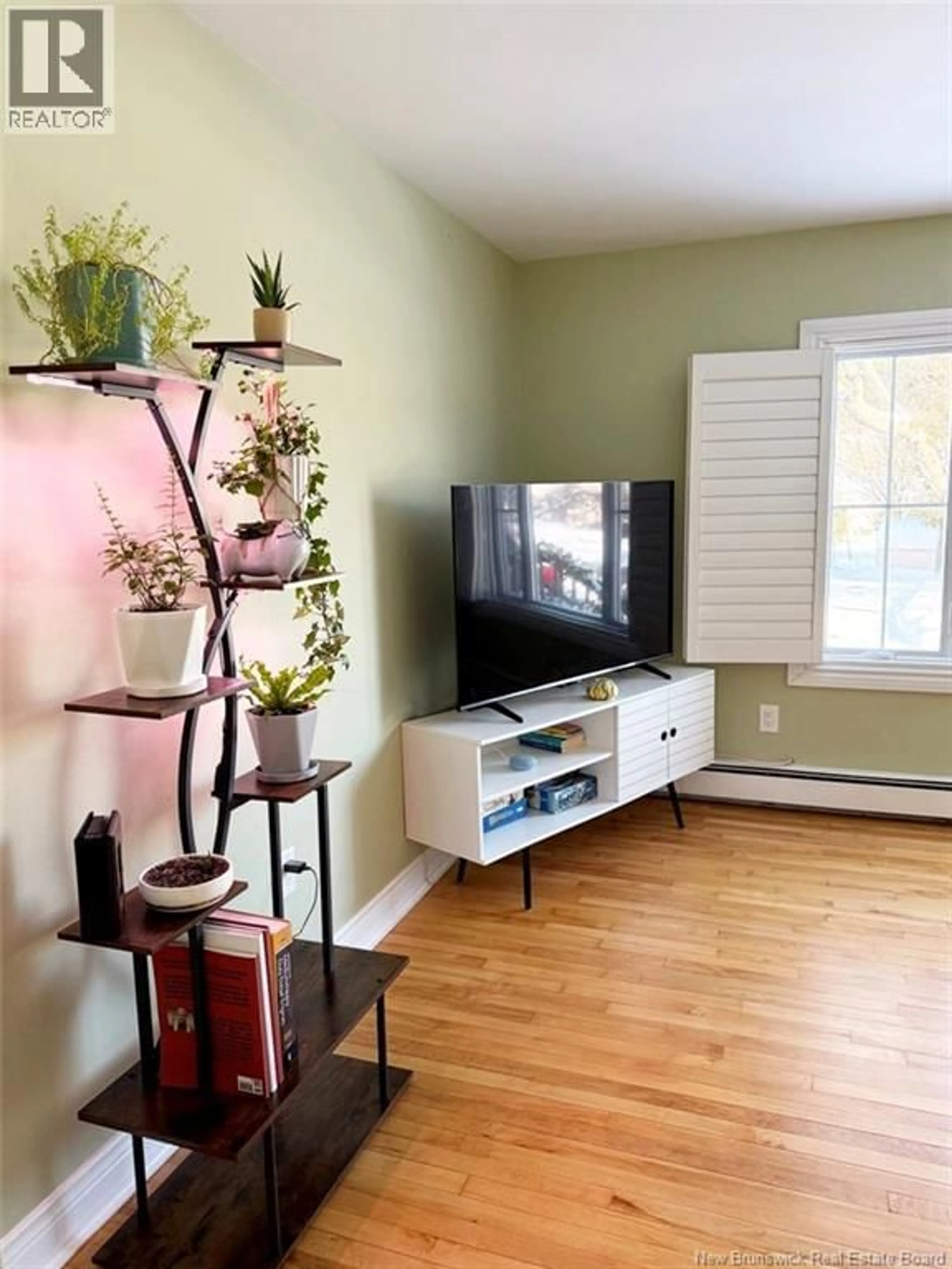 Living room with furniture, wood/laminate floor for 17 BEVERLY DRIVE, Saint John New Brunswick E2J3B1