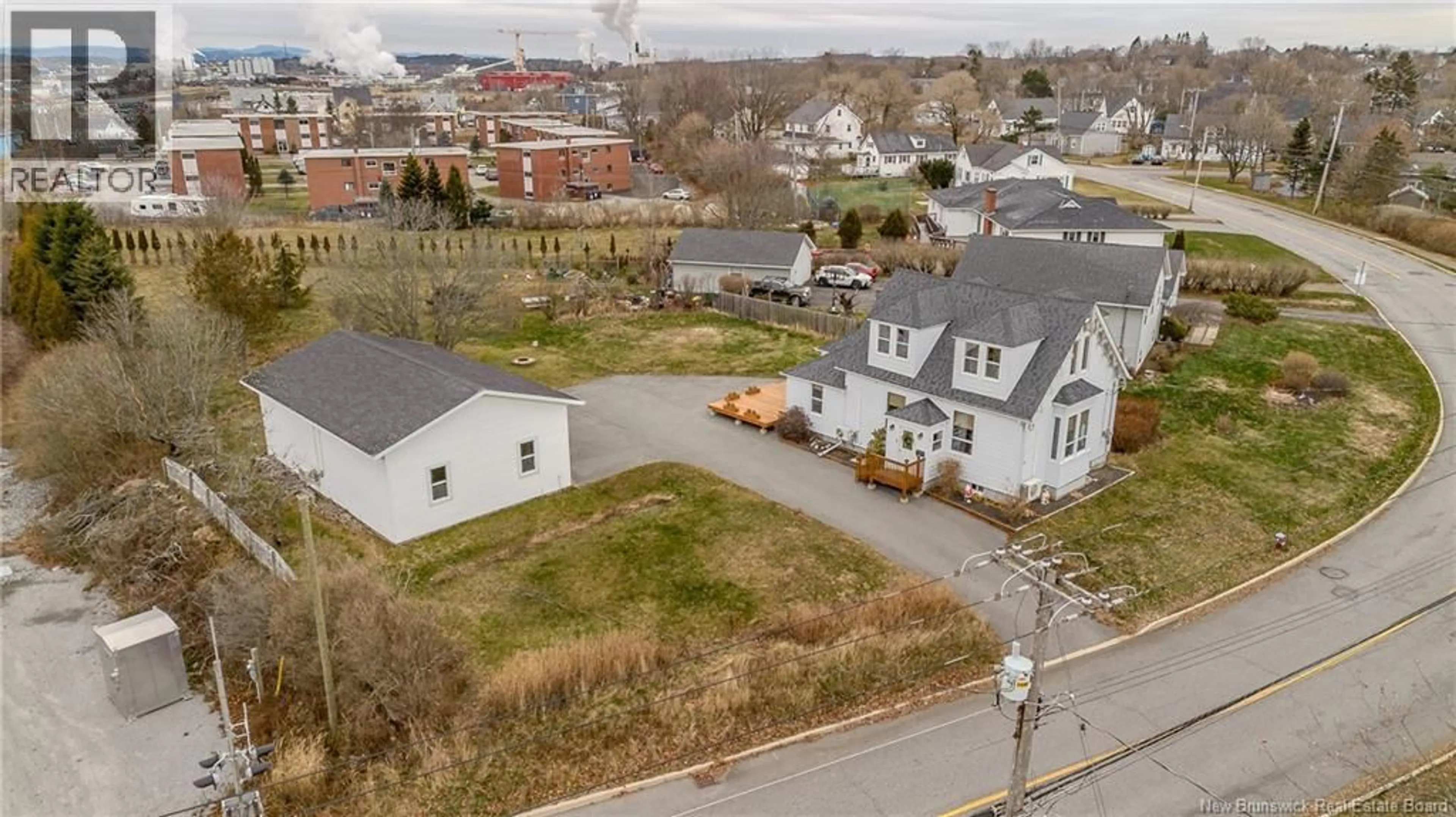 A pic from outside/outdoor area/front of a property/back of a property/a pic from drone, street for 754 SAND COVE ROAD, Saint John New Brunswick E2M3E1