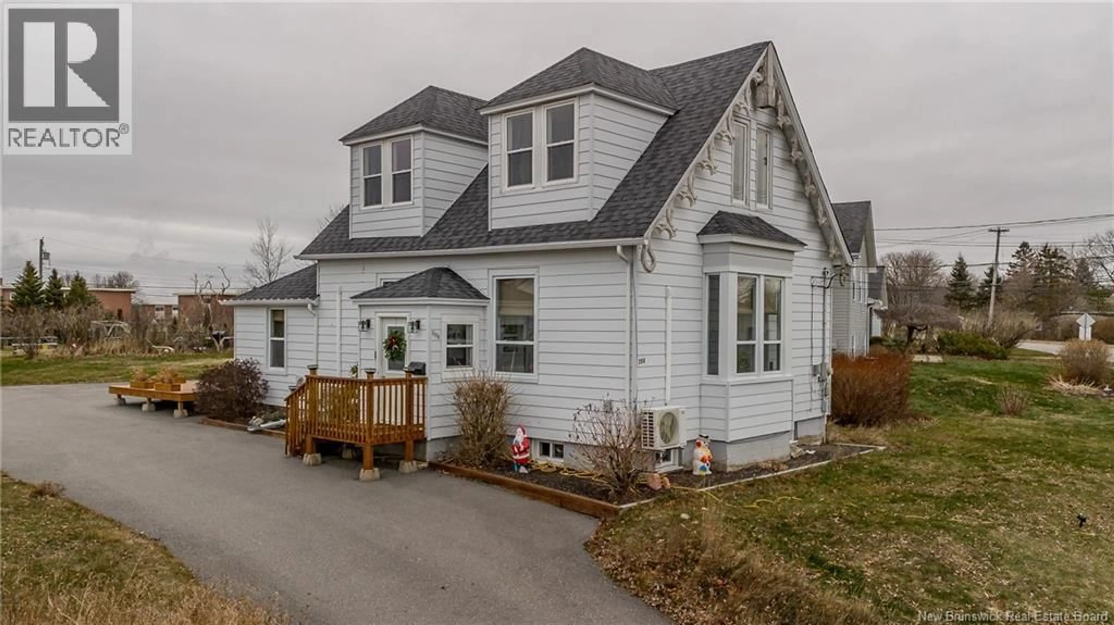 Home with vinyl exterior material, street for 754 SAND COVE ROAD, Saint John New Brunswick E2M3E1