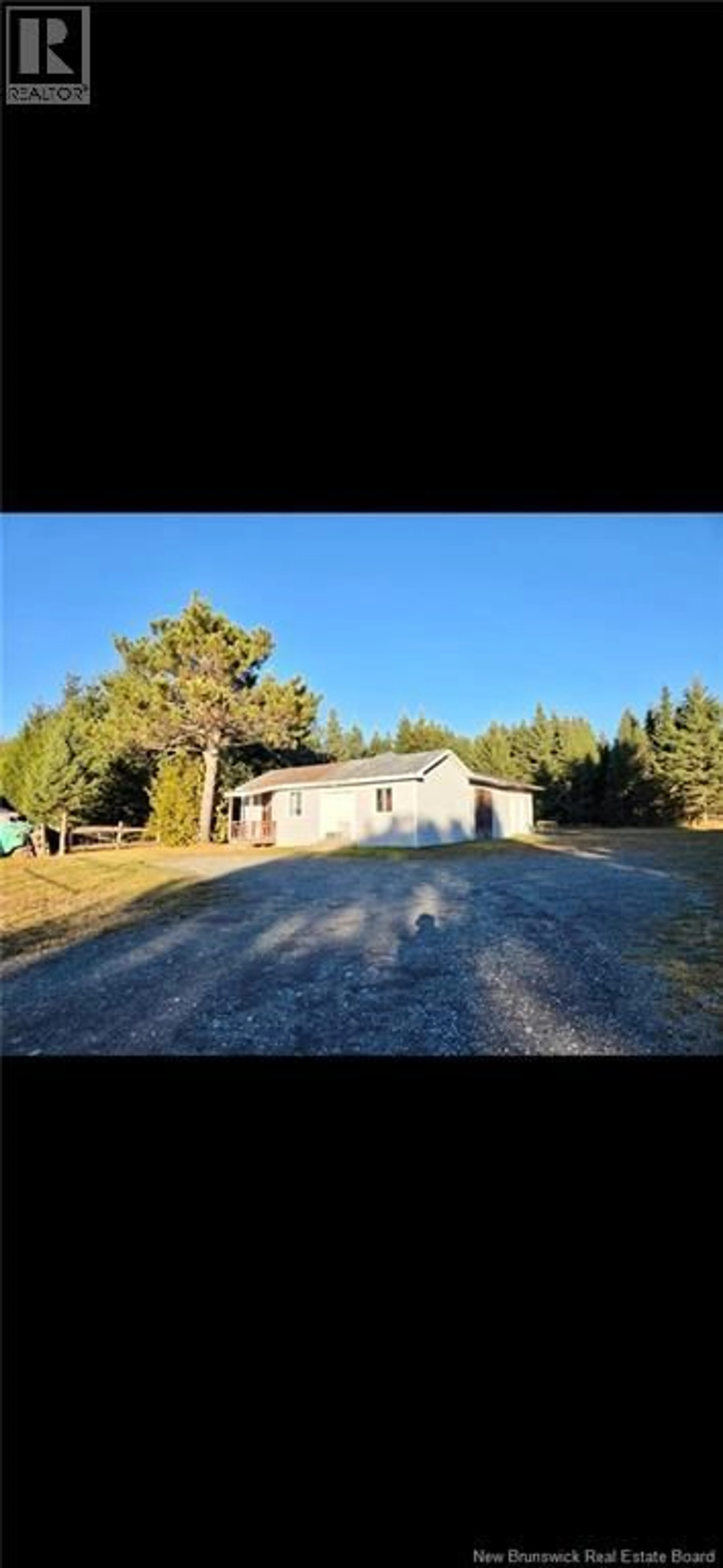 A pic from outside/outdoor area/front of a property/back of a property/a pic from drone, unknown for 95 RUE DES MONTAGNES, Kedgwick New Brunswick E3B1C6
