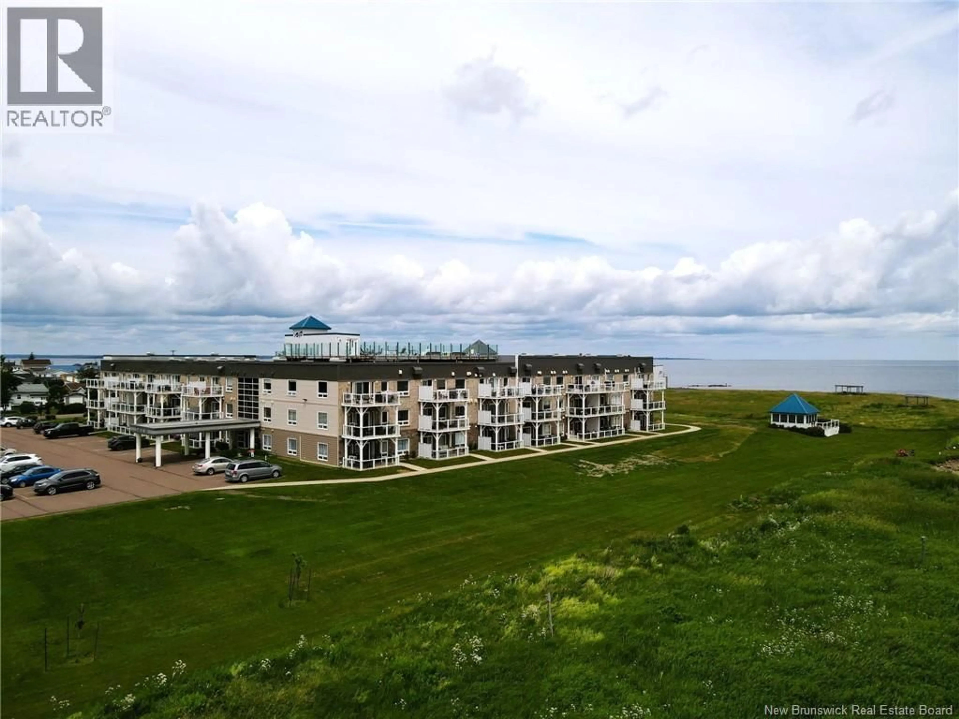 A pic from outside/outdoor area/front of a property/back of a property/a pic from drone, water/lake/river/ocean view for 118 - 69 CAP BIMET, Grand-Barachois New Brunswick E4P6X5