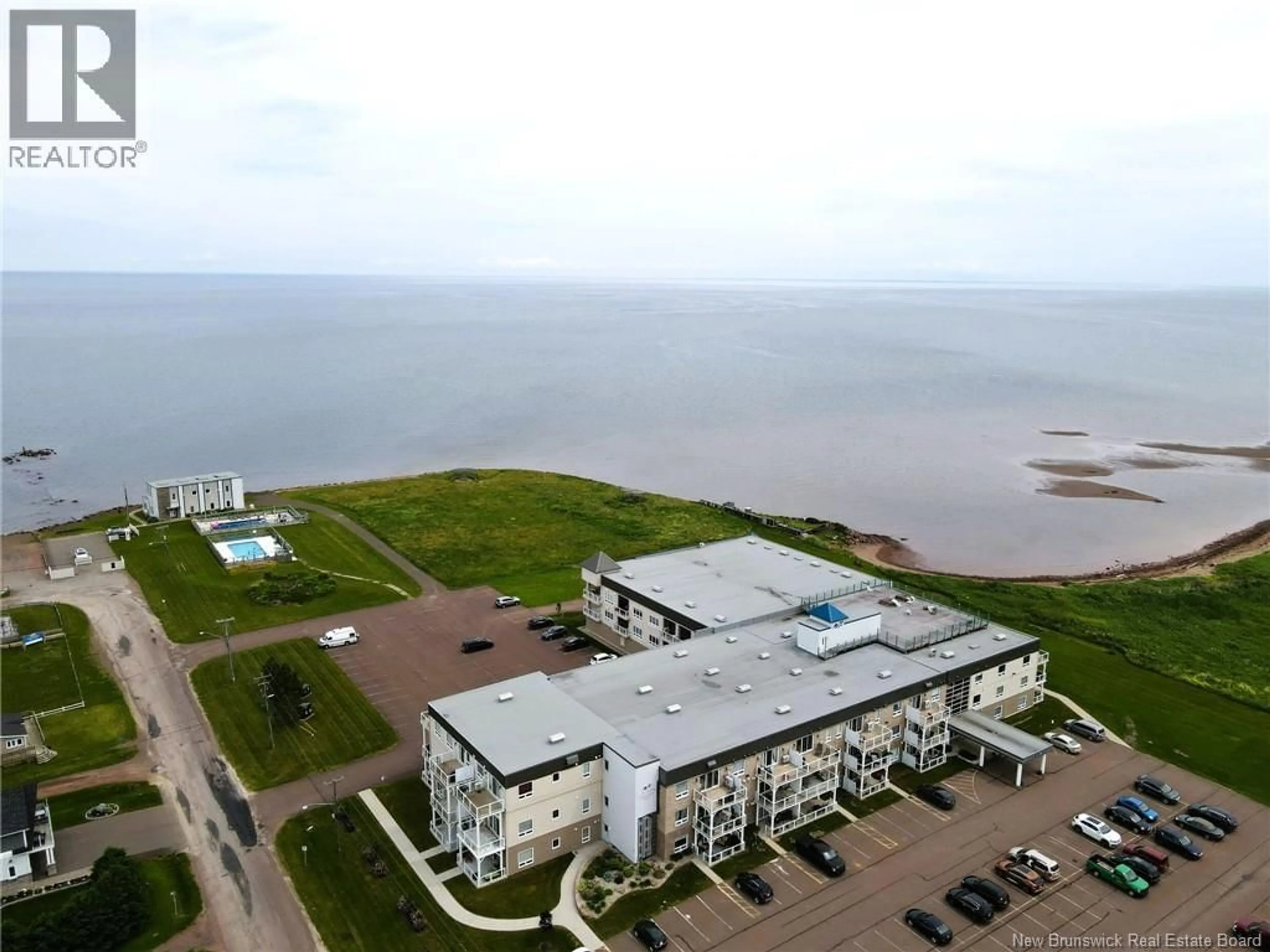A pic from outside/outdoor area/front of a property/back of a property/a pic from drone, water/lake/river/ocean view for 118 - 69 CAP BIMET, Grand-Barachois New Brunswick E4P6X5
