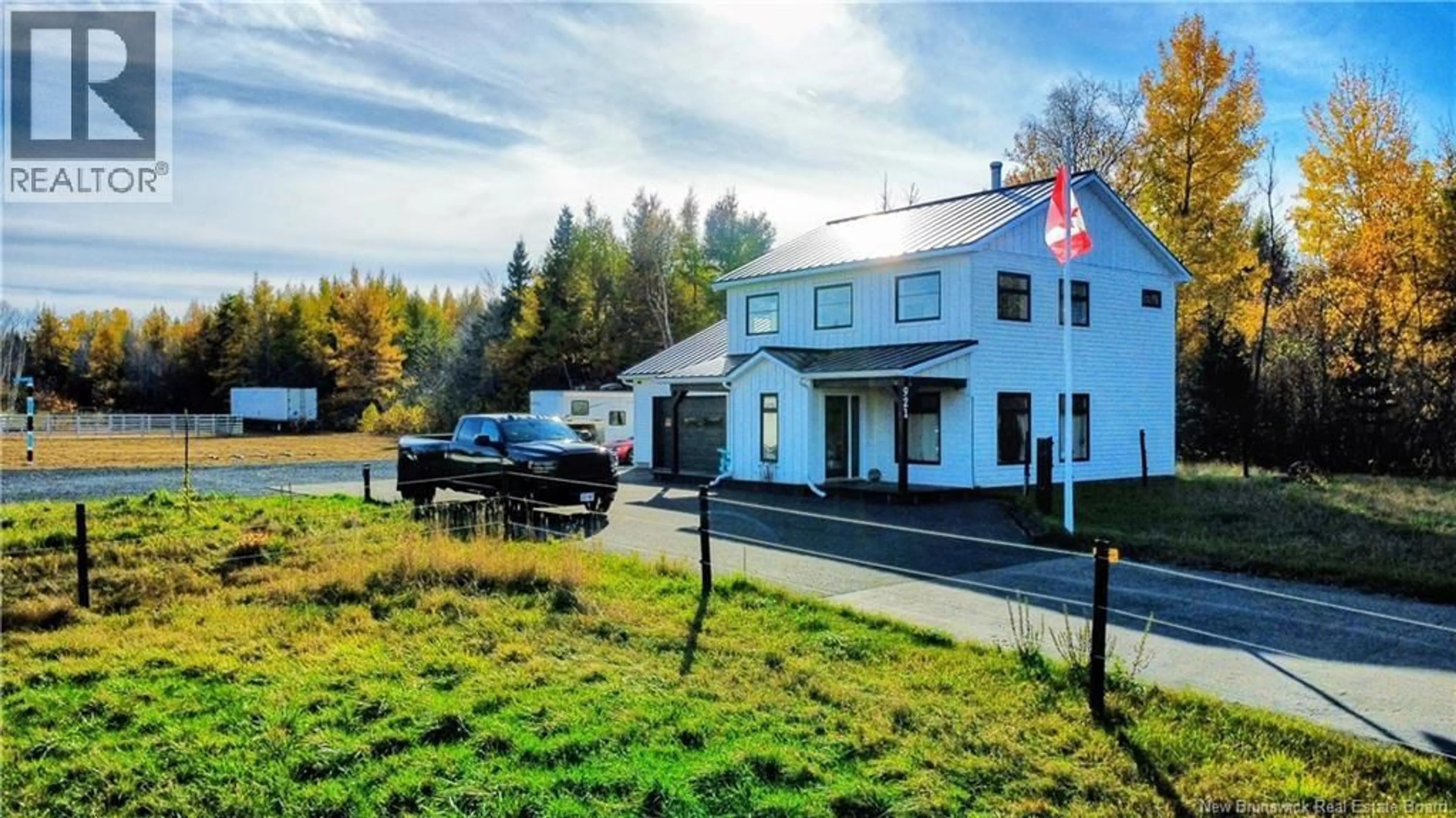 A pic from outside/outdoor area/front of a property/back of a property/a pic from drone, unknown for 921 RUE PINET STREET, Bertrand New Brunswick E1W1L8