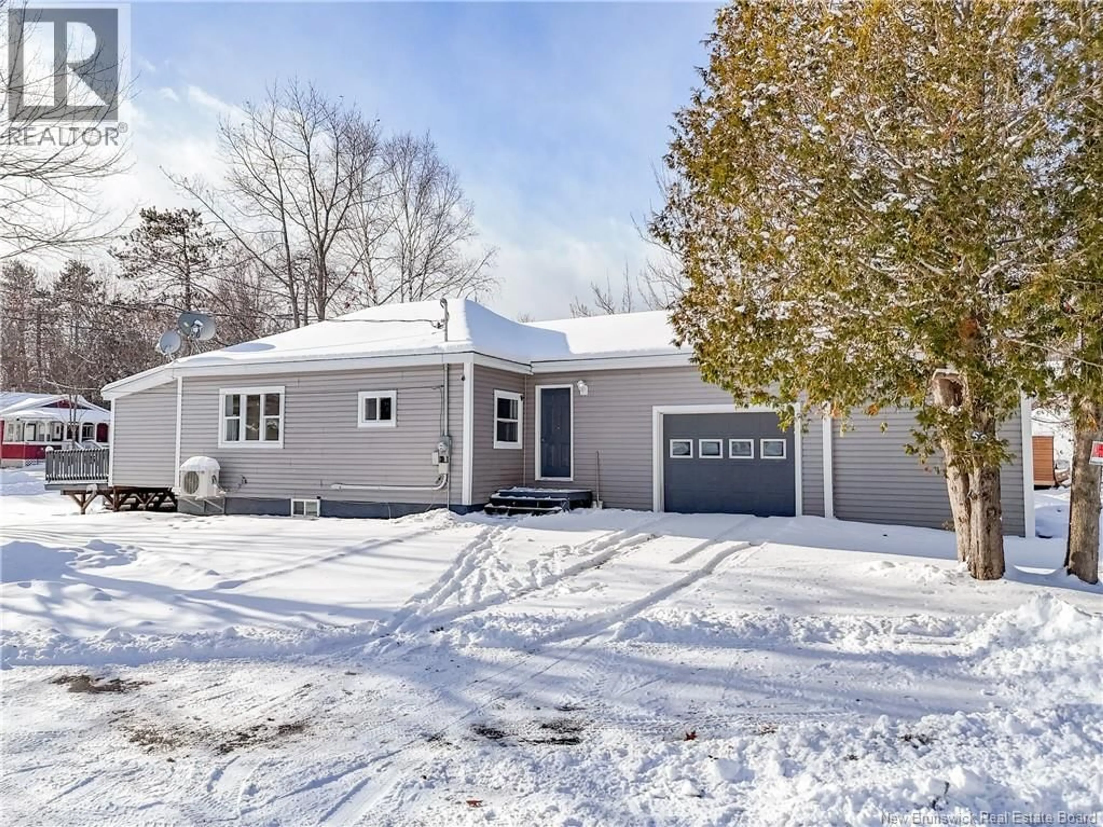 Home with vinyl exterior material, street for 58 LAKE AVENUE, McAdam New Brunswick E6J1P2