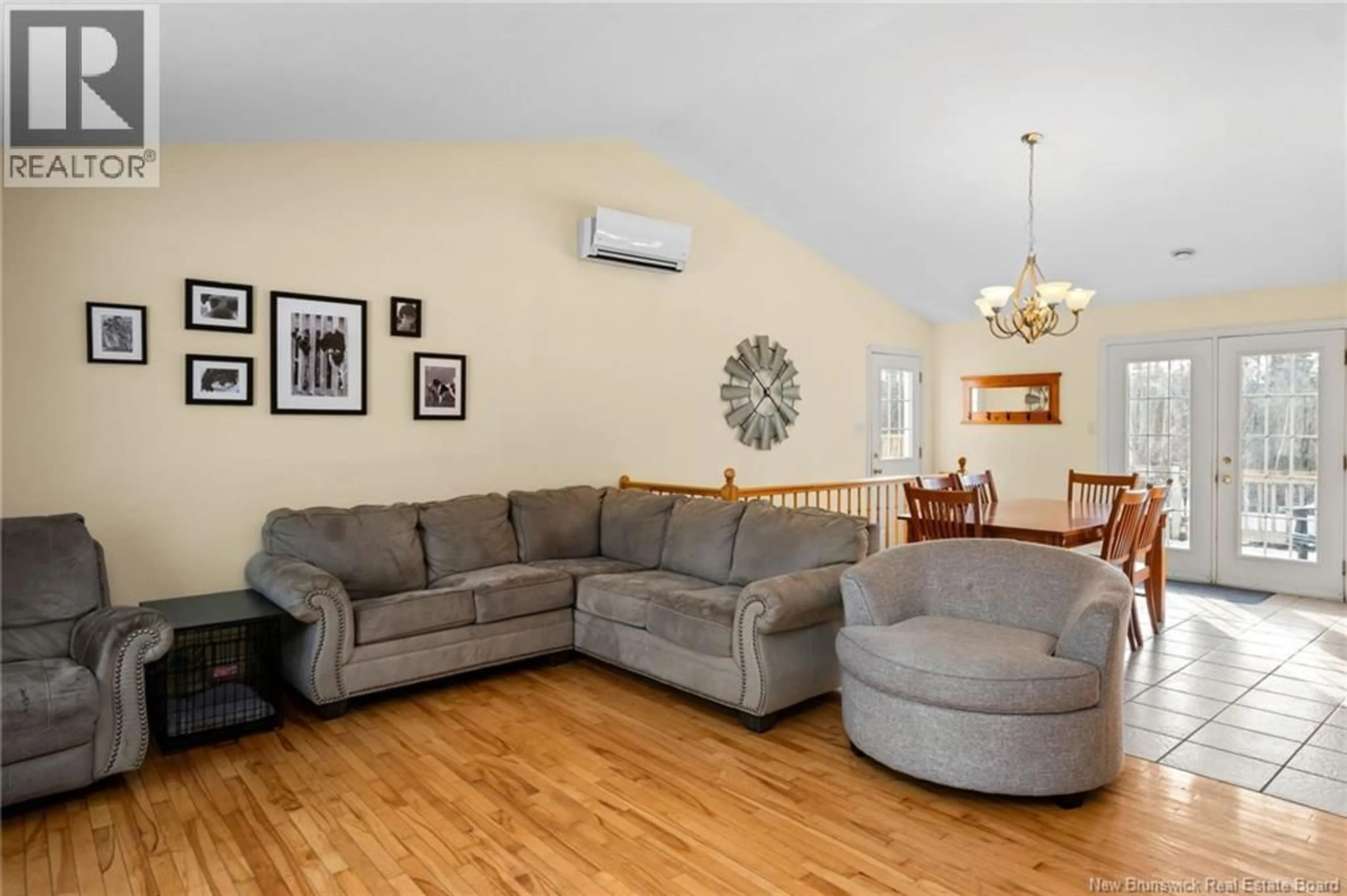 Living room with furniture, wood/laminate floor for 58 GERVIC CRESCENT, Grand-Barachois New Brunswick E4P7N8