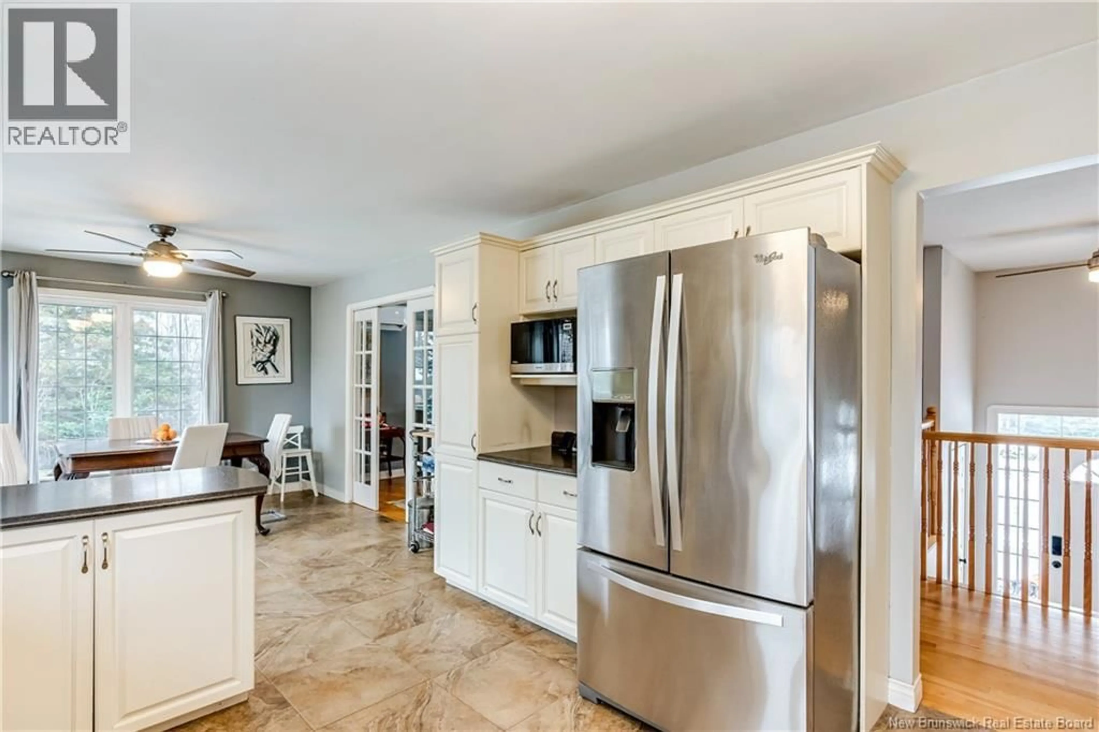 Open concept kitchen, ceramic/tile floor for 21 DES PERDRIX COURT, Barachois New Brunswick E4P7H6