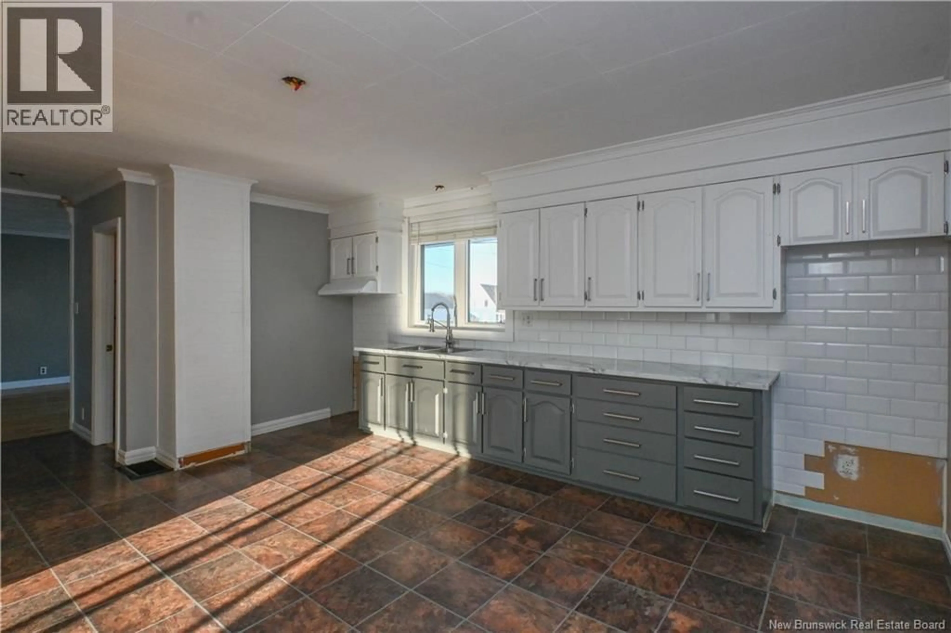 Open concept kitchen, ceramic/tile floor for 1965 ROUTE 335, Saint-Simon New Brunswick E8P2A8
