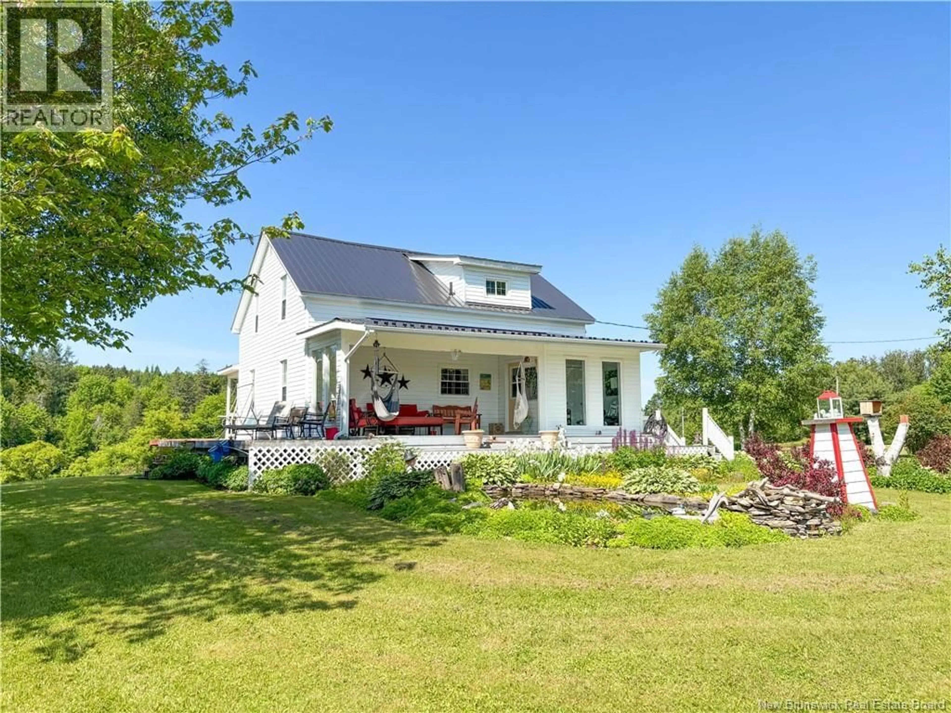 A pic from outside/outdoor area/front of a property/back of a property/a pic from drone, unknown for 30 SMITH HEIGHTS, Wicklow New Brunswick E7L3W9