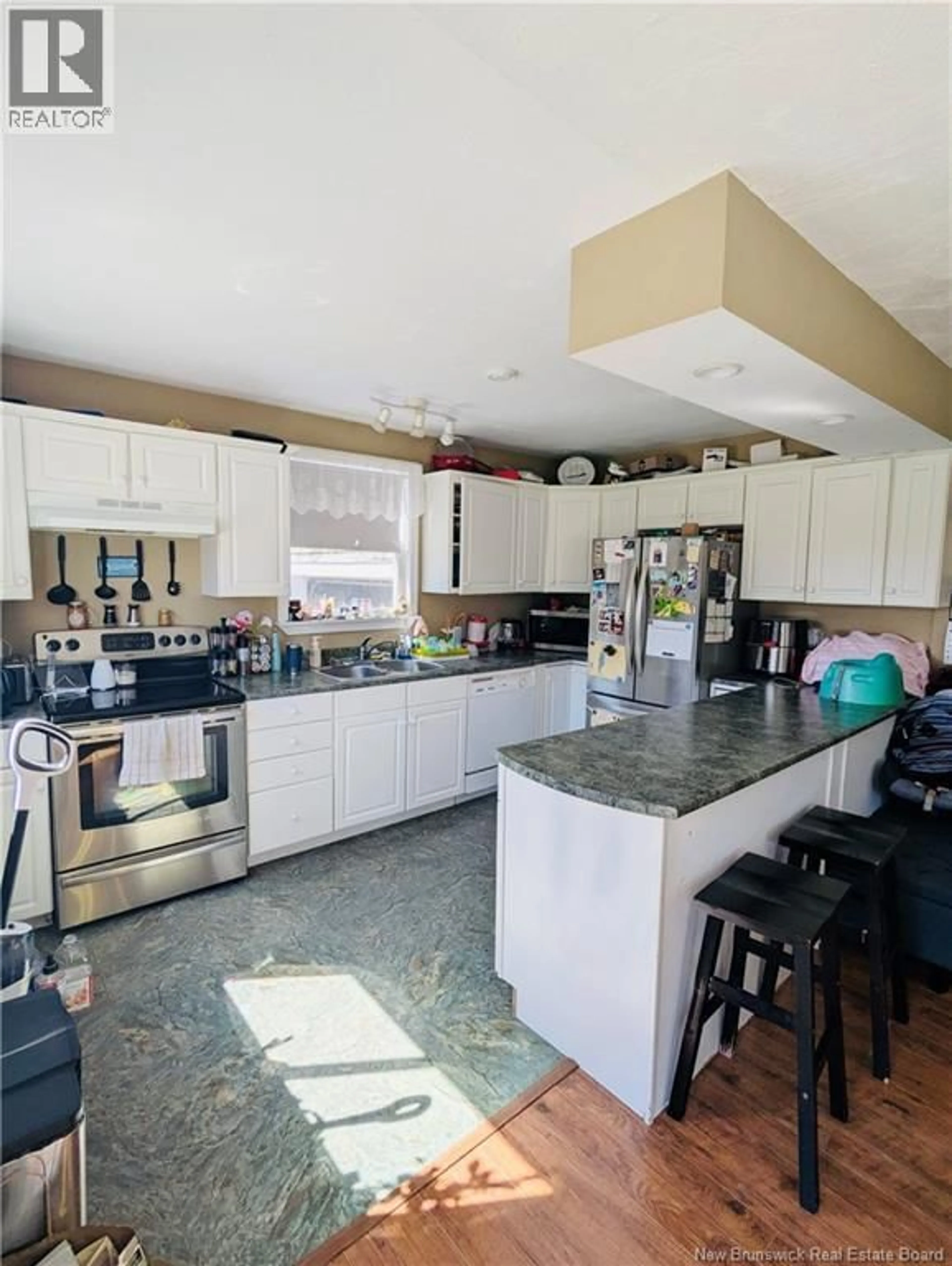 Open concept kitchen, ceramic/tile floor for 23 MINNIE ROAD, Pennfield New Brunswick E5H2B1