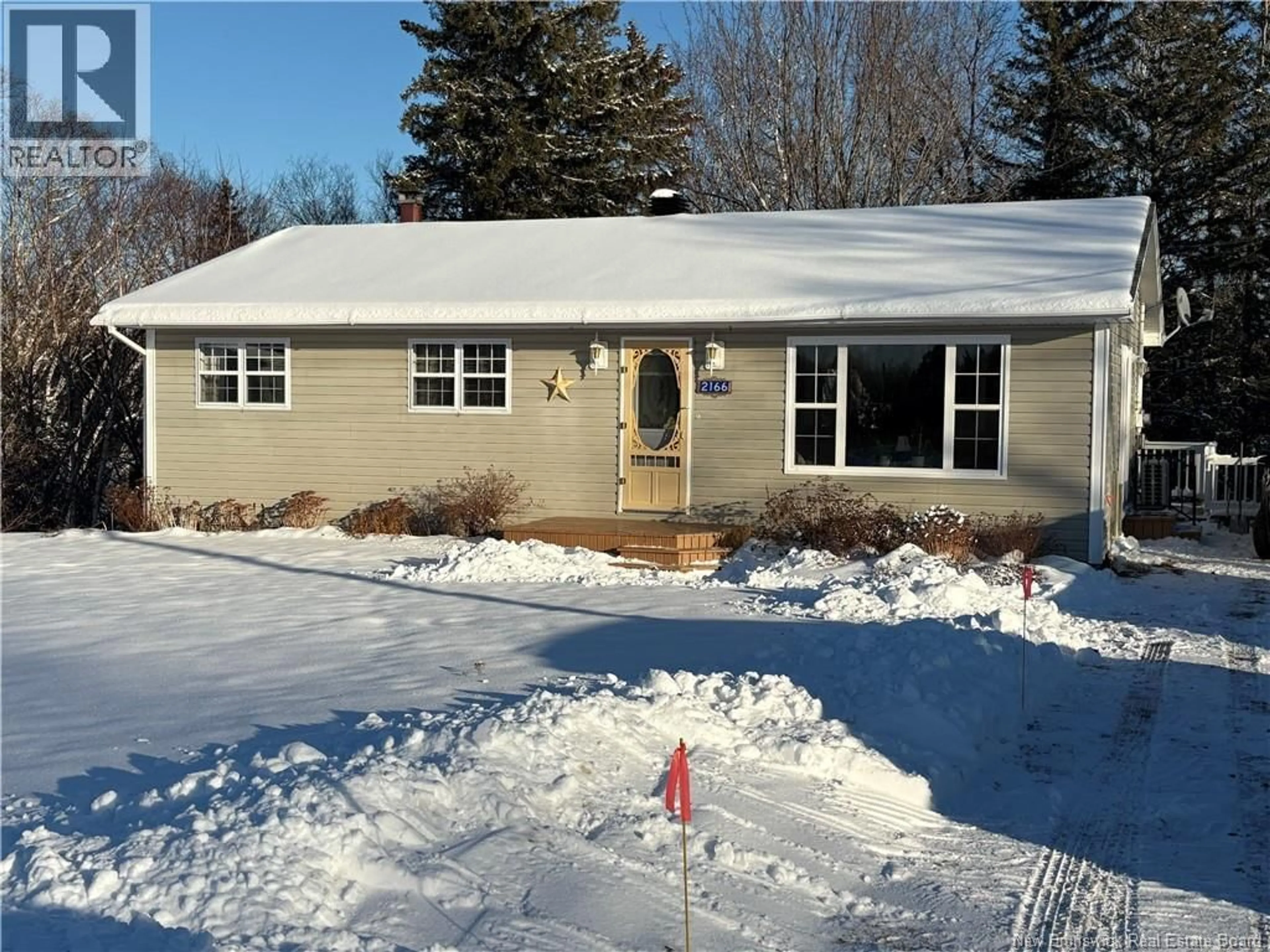 Home with vinyl exterior material, street for 2166 CARRON DRIVE, Bathurst New Brunswick E2A6A1