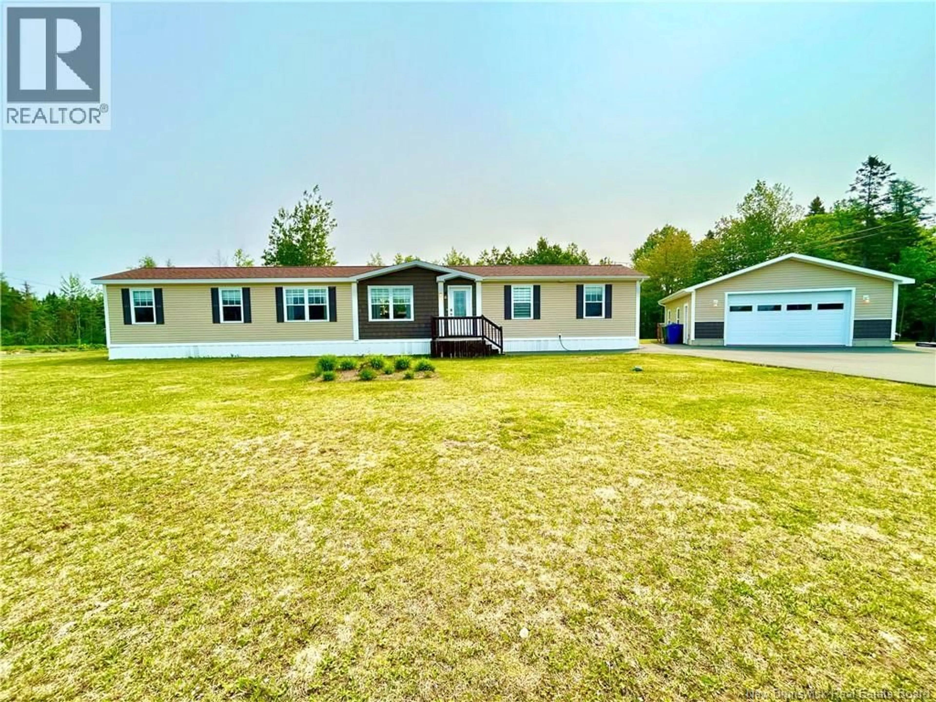 A pic from outside/outdoor area/front of a property/back of a property/a pic from drone, unknown for 6 DONAT STREET, Saint-Isidore New Brunswick E8M0A5