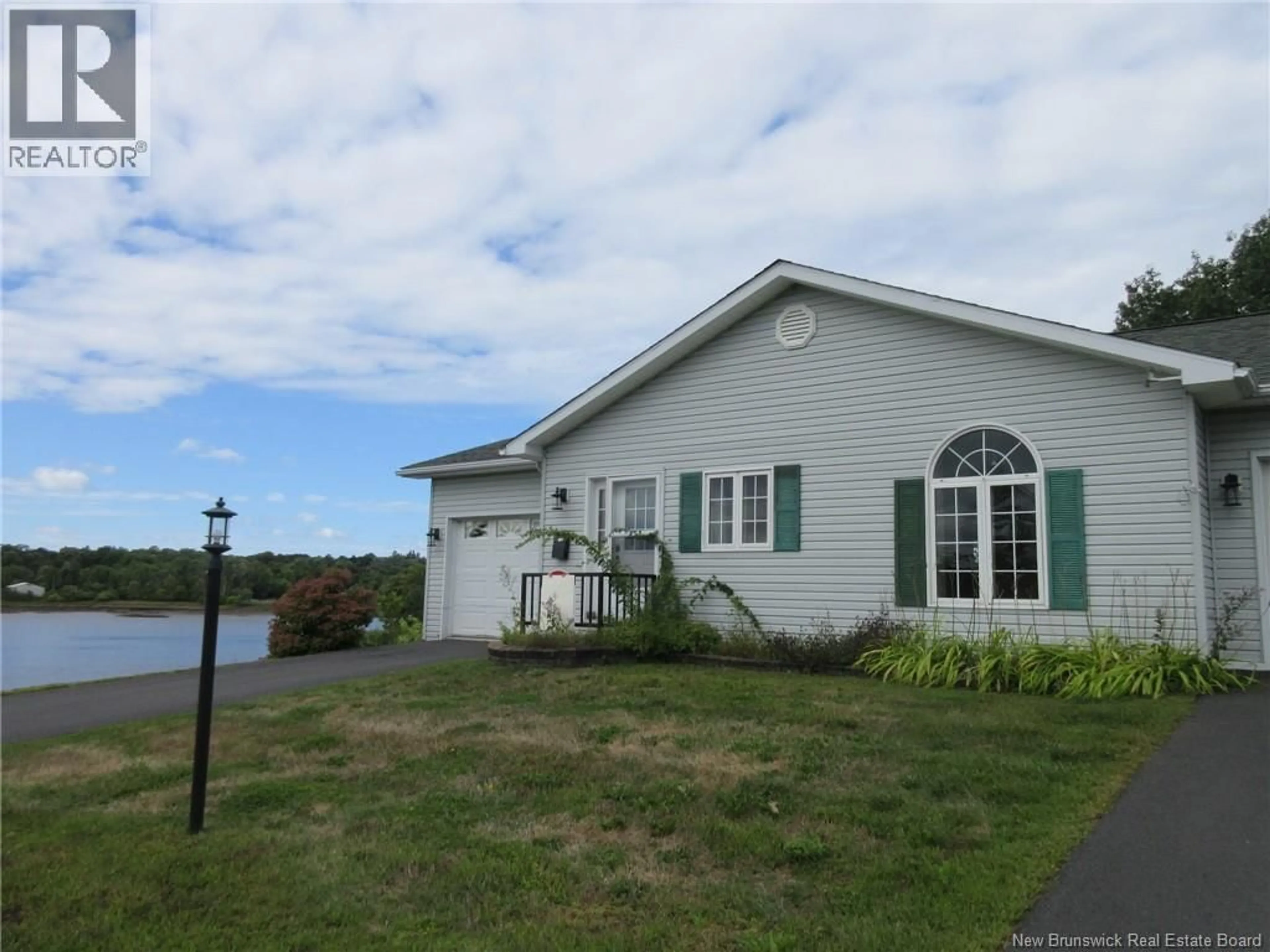 A pic from outside/outdoor area/front of a property/back of a property/a pic from drone, water/lake/river/ocean view for H - 61 PRINCE WILLIAM STREET, St. Stephen New Brunswick E3L1S5