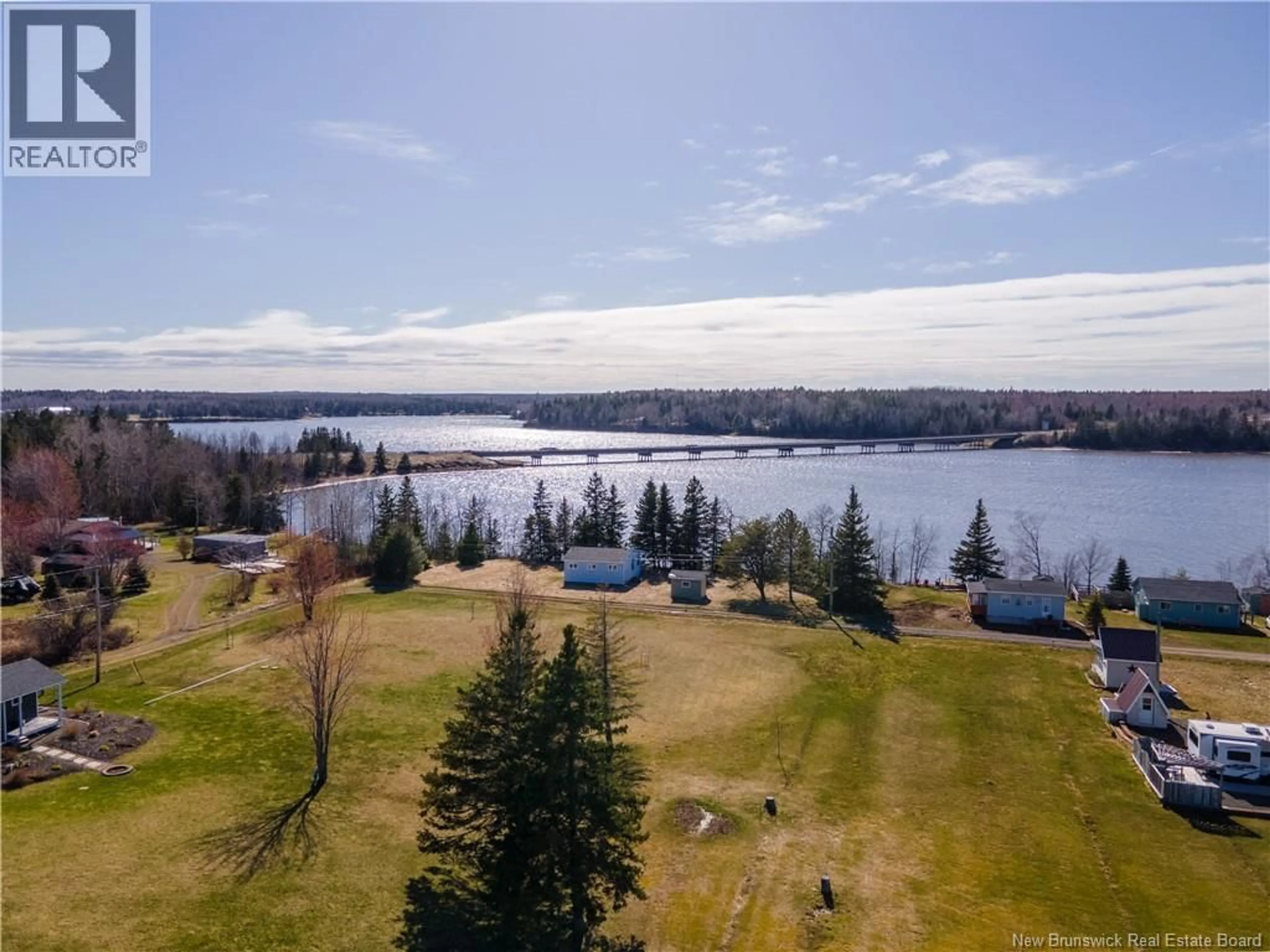 A pic from outside/outdoor area/front of a property/back of a property/a pic from drone, water/lake/river/ocean view for 31 RITA ROAD, Bouctouche New Brunswick E4S3X7