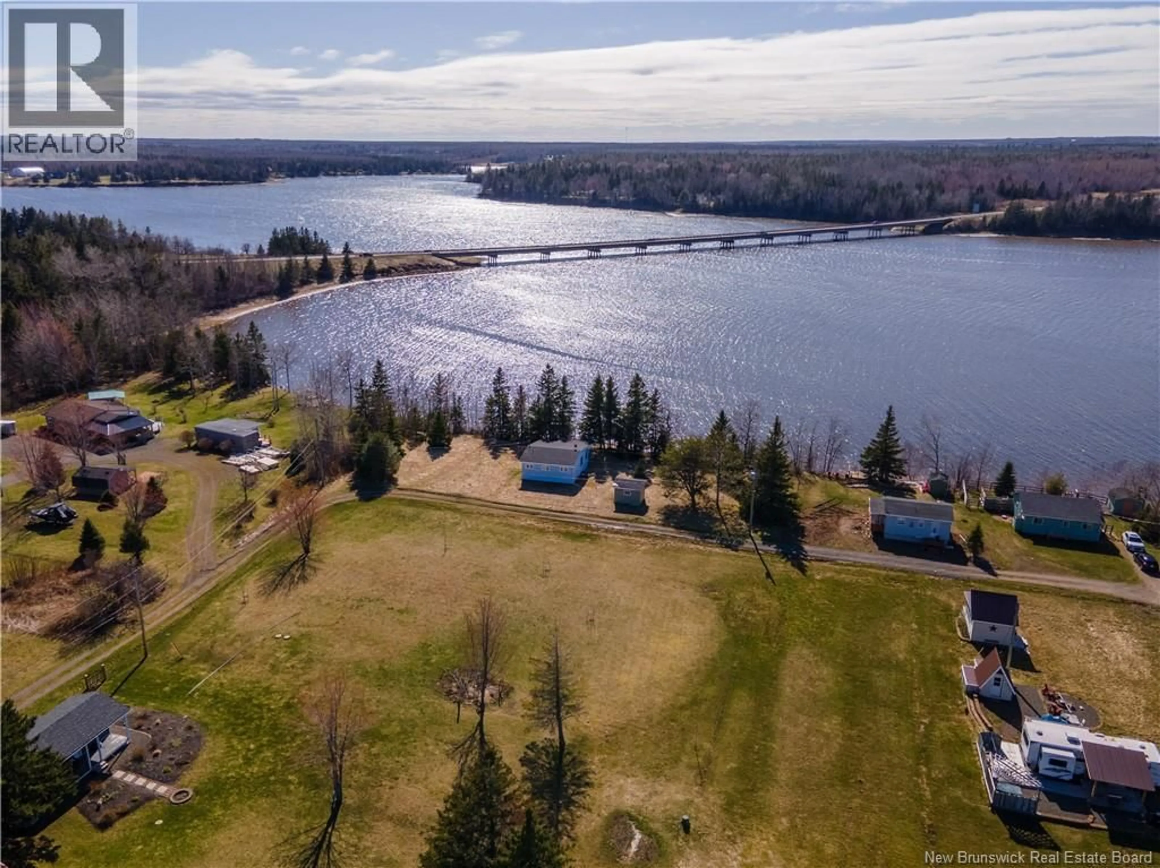 A pic from outside/outdoor area/front of a property/back of a property/a pic from drone, water/lake/river/ocean view for 31 RITA ROAD, Bouctouche New Brunswick E4S3X7