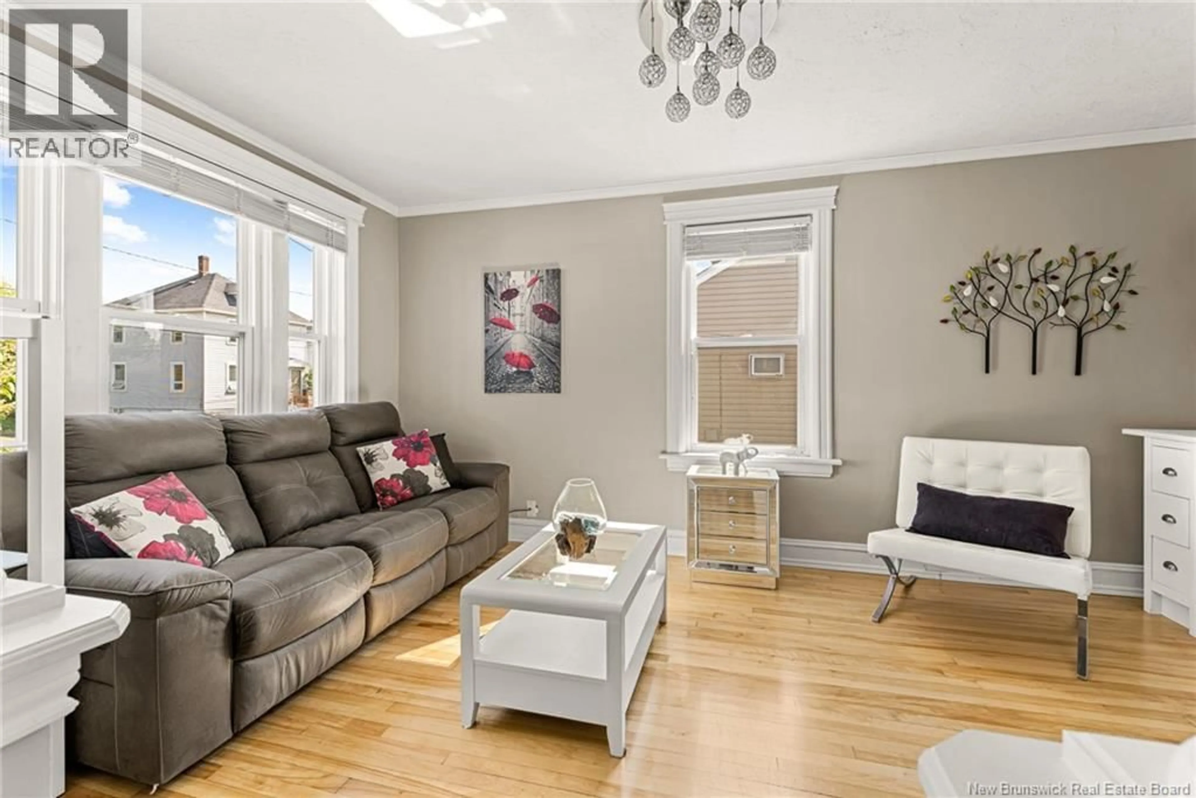 Living room with furniture, wood/laminate floor for 20-22 SIXTH STREET, Moncton New Brunswick E1E3G6
