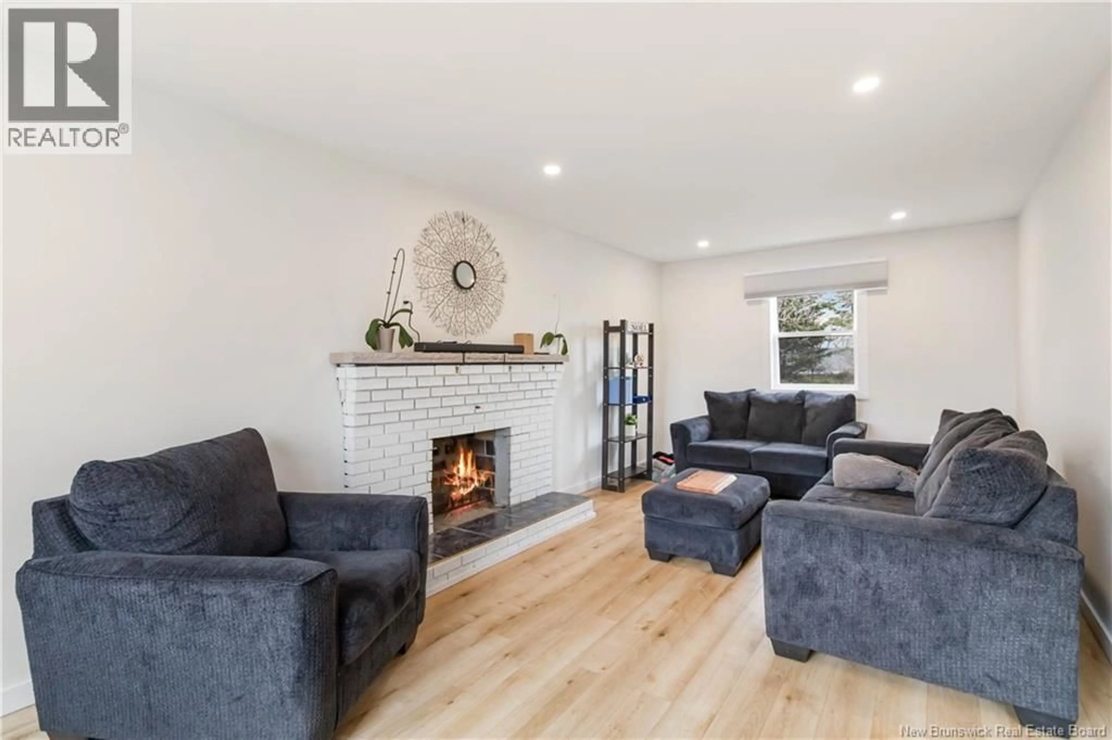 Living room with furniture, wood/laminate floor for 80 EALEY, Riverview New Brunswick E1B1E8