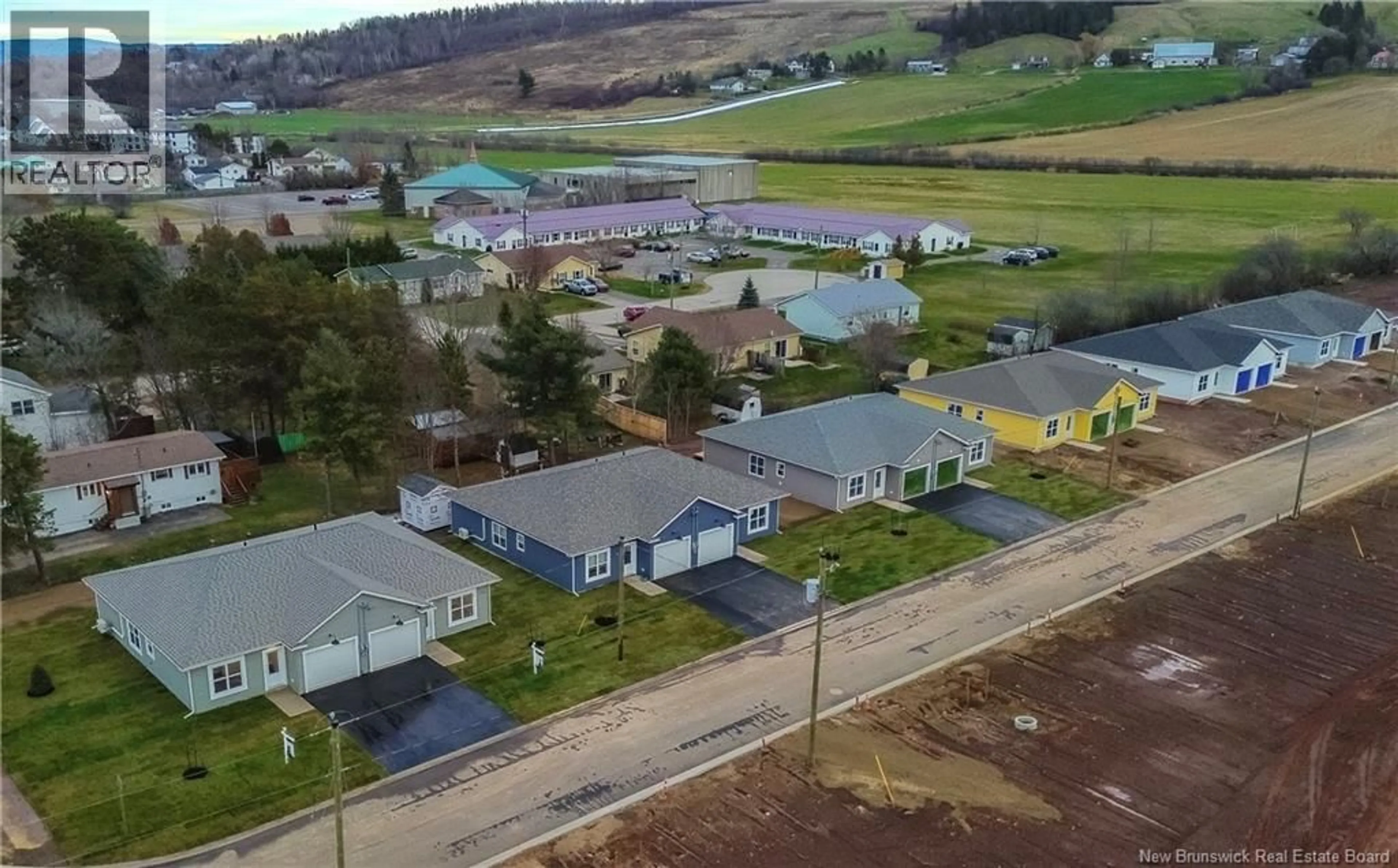 A pic from outside/outdoor area/front of a property/back of a property/a pic from drone, street for 20 OTTY AVENUE, Sussex New Brunswick E4E0M5