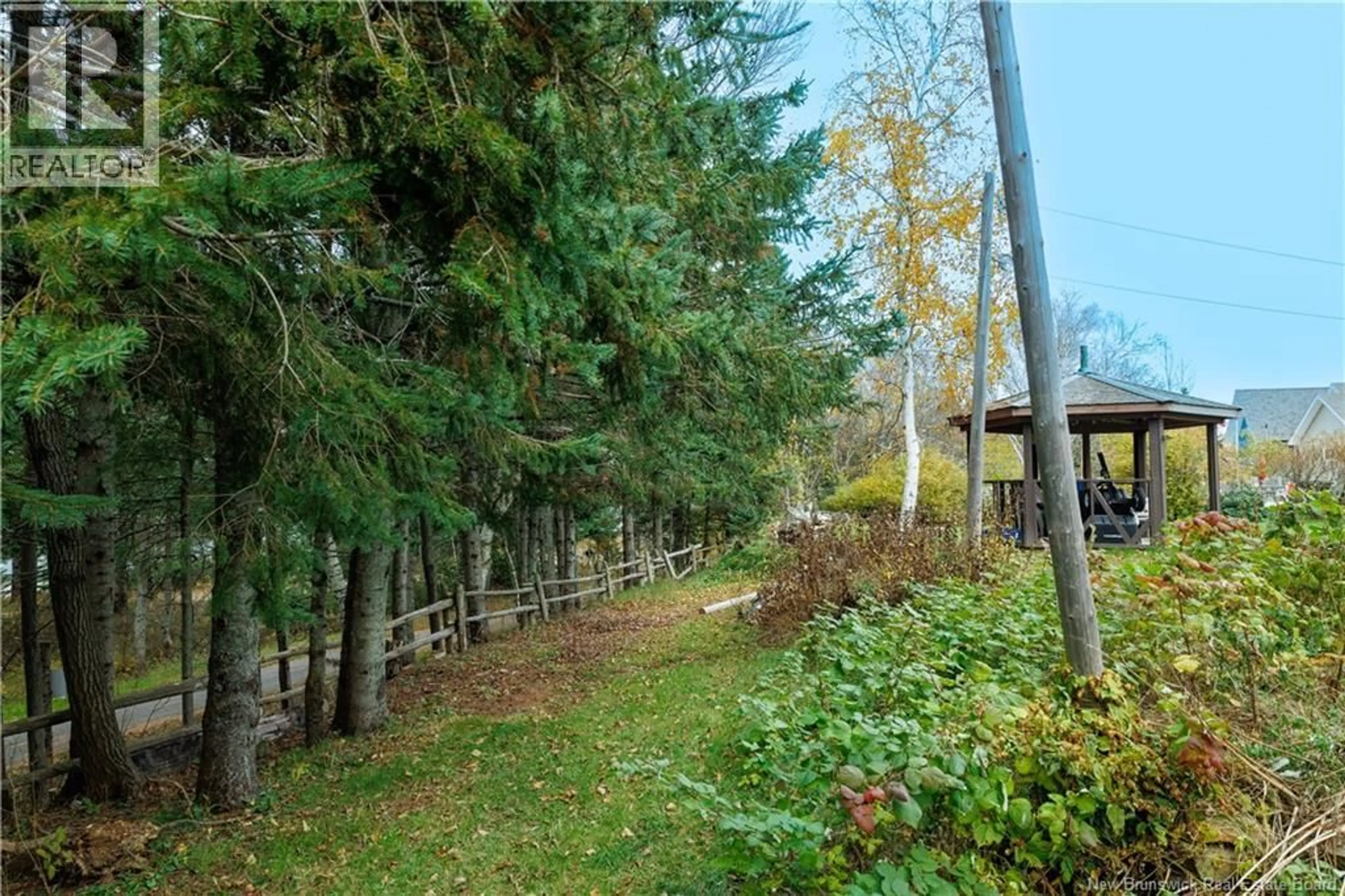 Patio, forest/trees view for 539 BOULEVARD ST PIERRE O, Caraquet New Brunswick E1W1A3