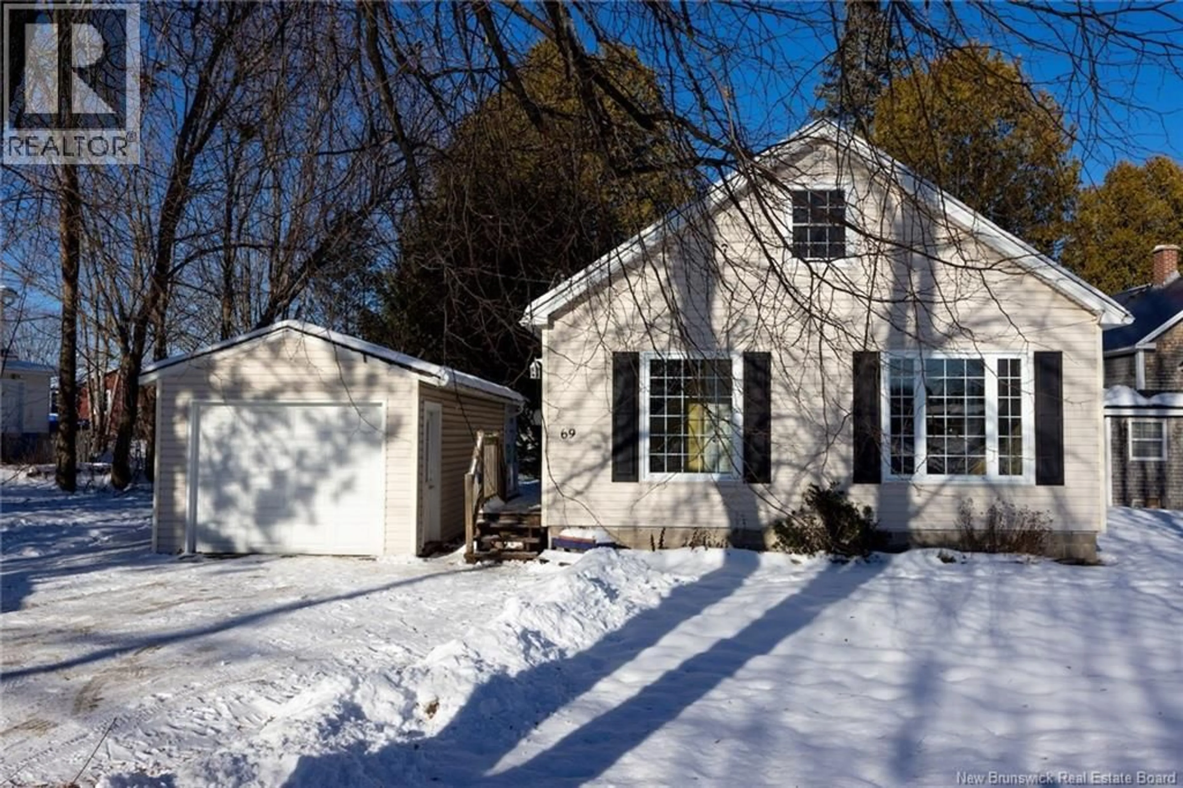 Home with vinyl exterior material, street for 69 WATTERS DRIVE, Fredericton New Brunswick E3A3S9